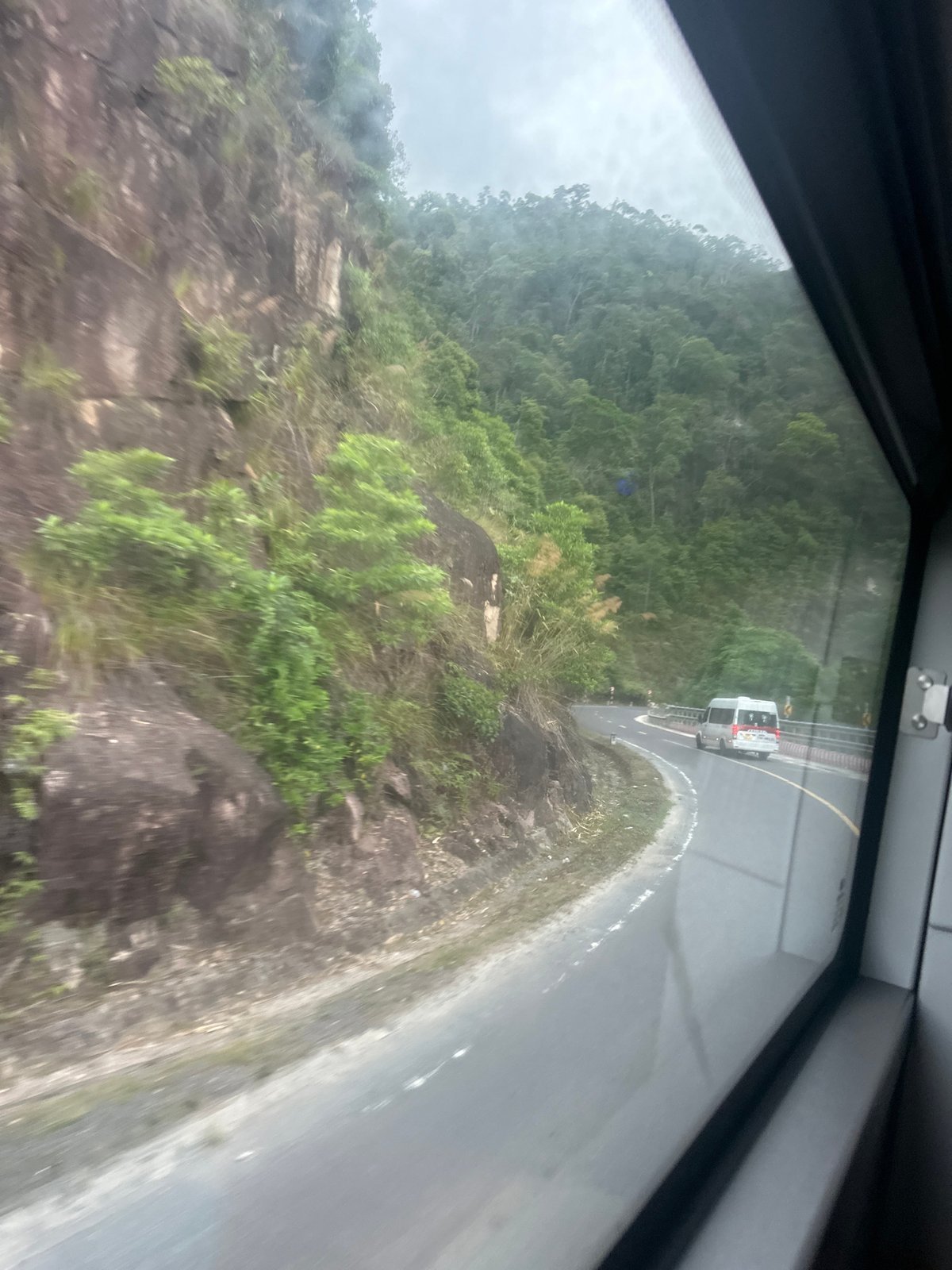Cable car passenger documents mountainous terrain in Nam Khanh Vinh