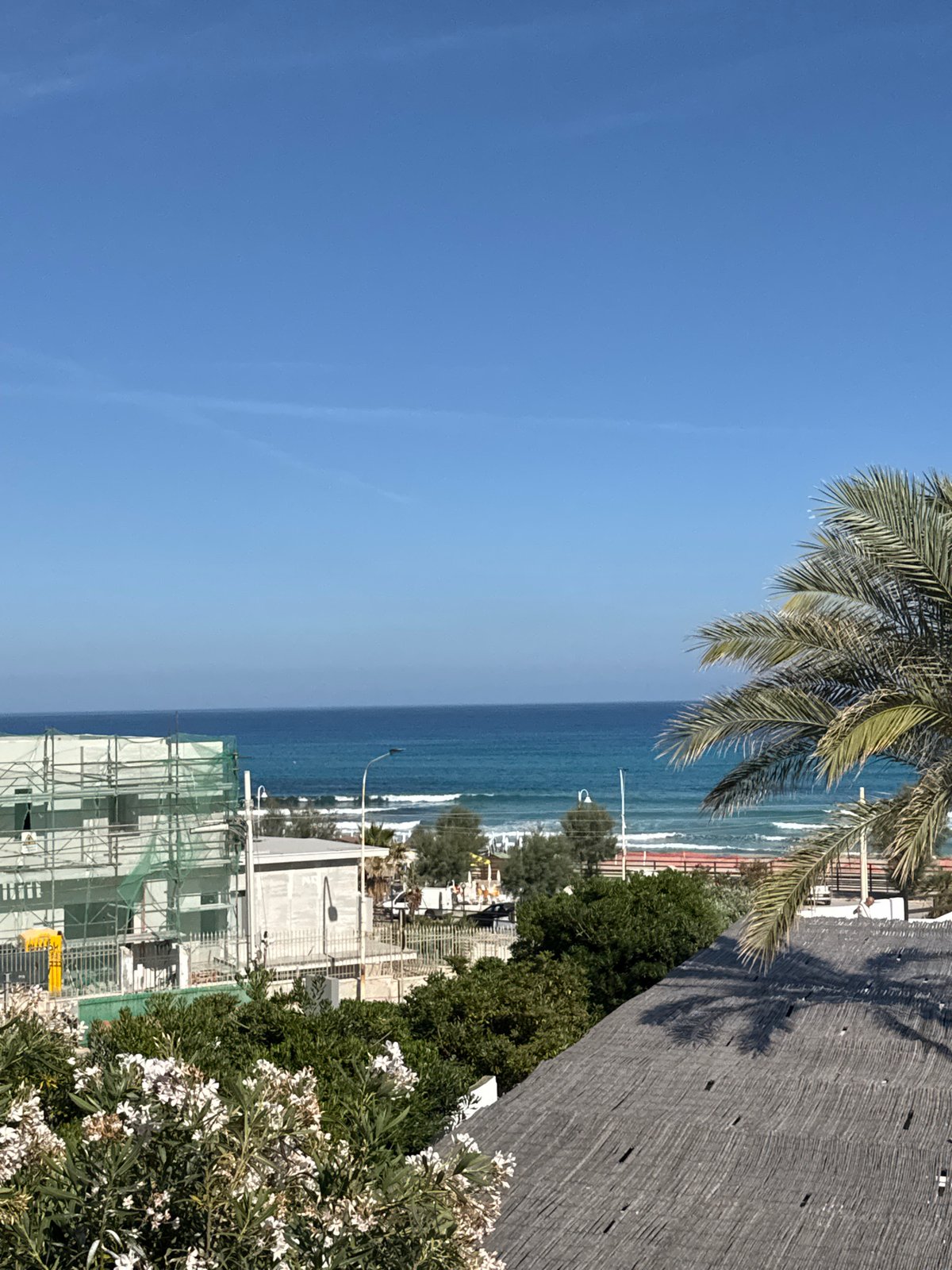 Sunny morning coastal life documented across Capaci, Italy
