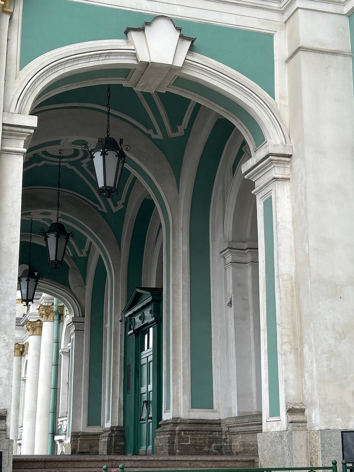 Tourist documents Winter Palace and Neva River scenes in Saint Petersburg