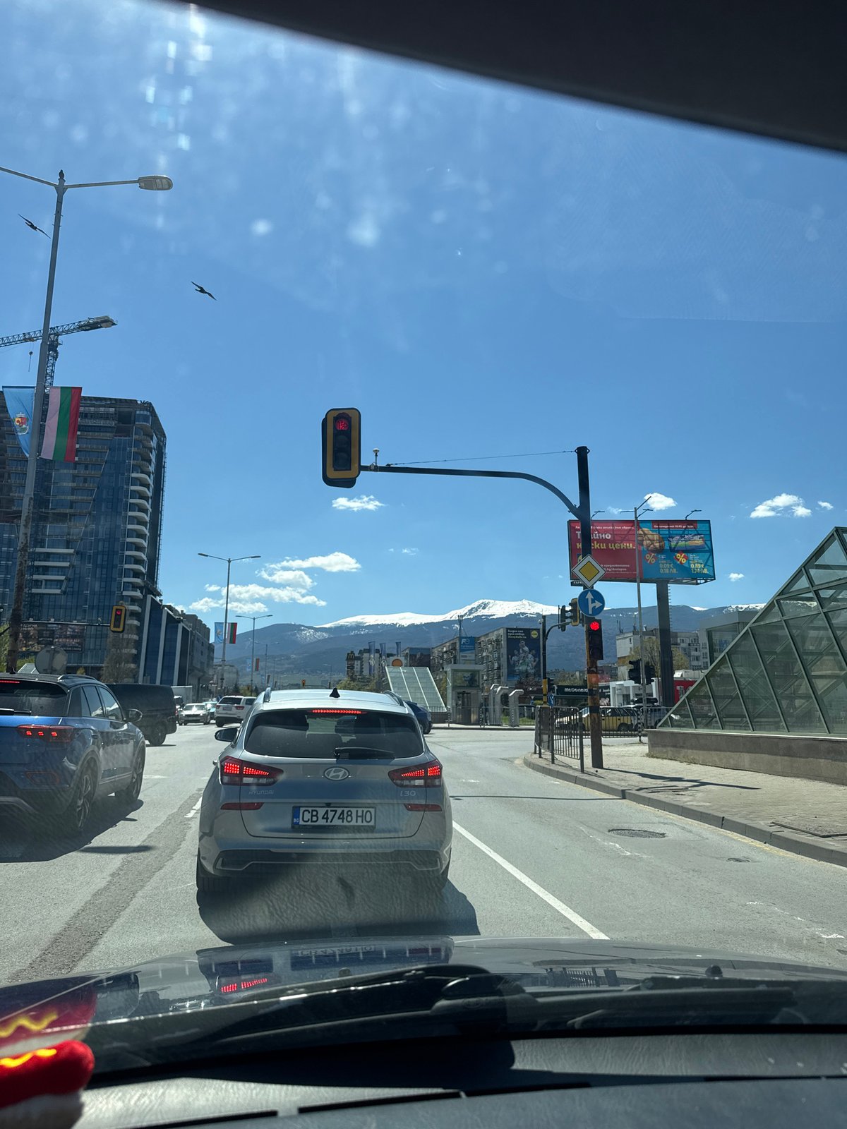Morning scenes captured in Sofia: traffic congestion, McDonald's meal