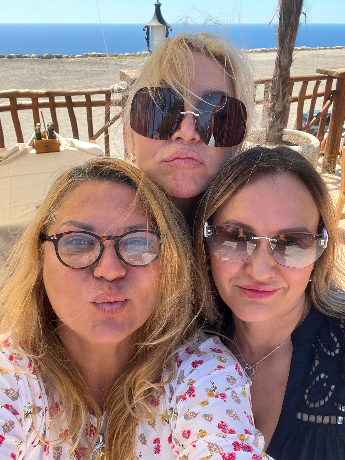 Tourists explore Montenegro coastal markets and restaurants during midday