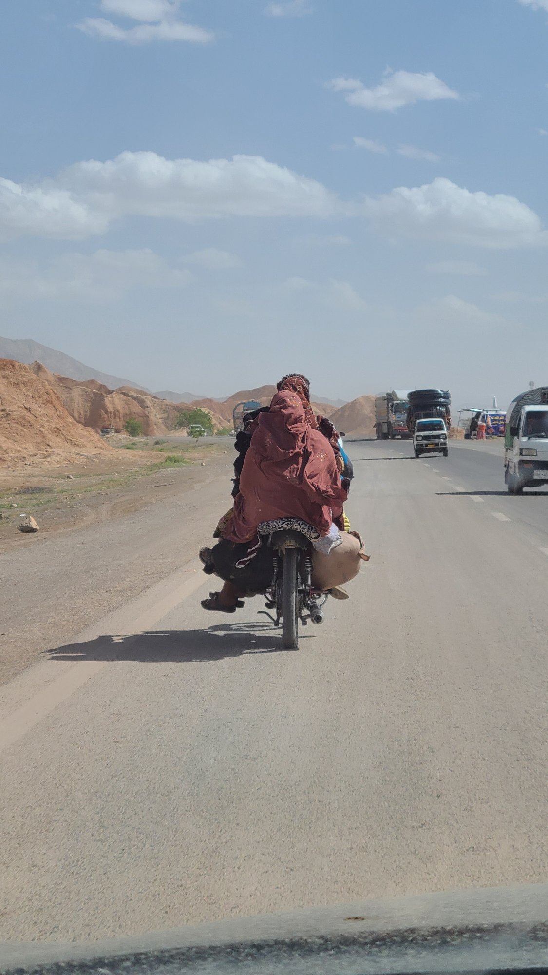 Motorcyclist in traditional dress spotted in Kuchlak, Pakistan