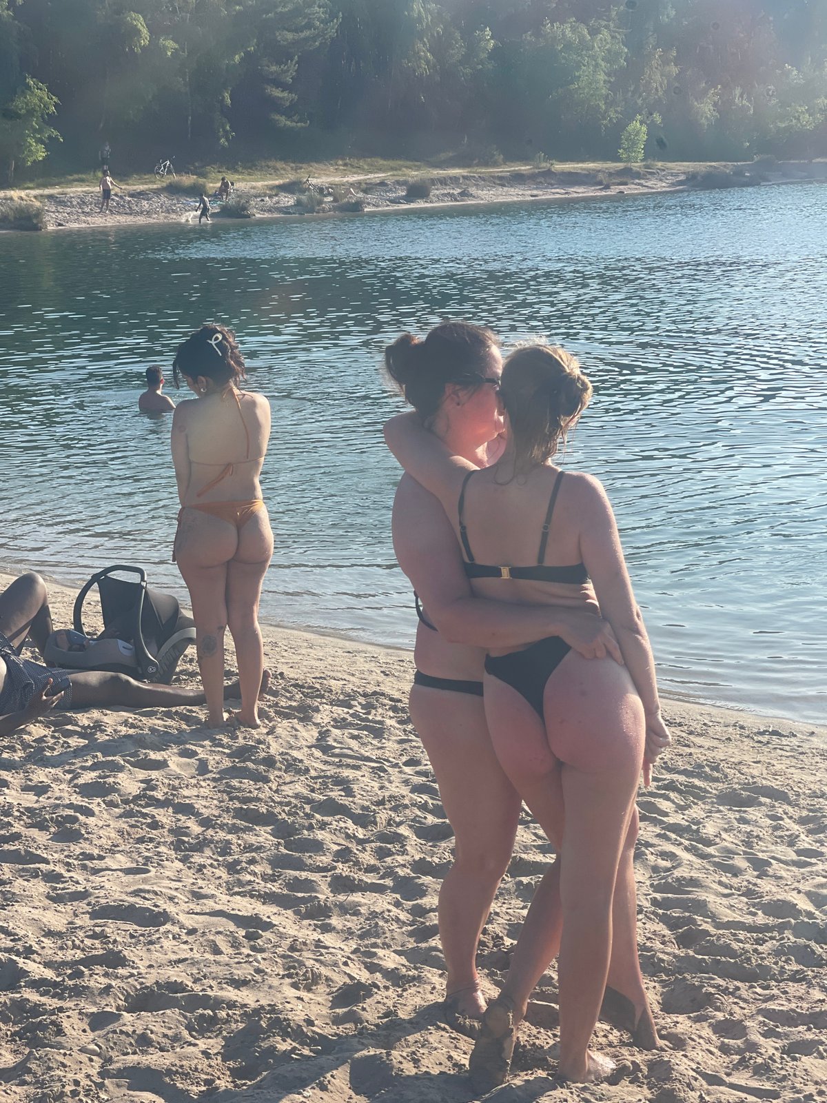 Sunny beach day: swimming, lounging, and cold beers