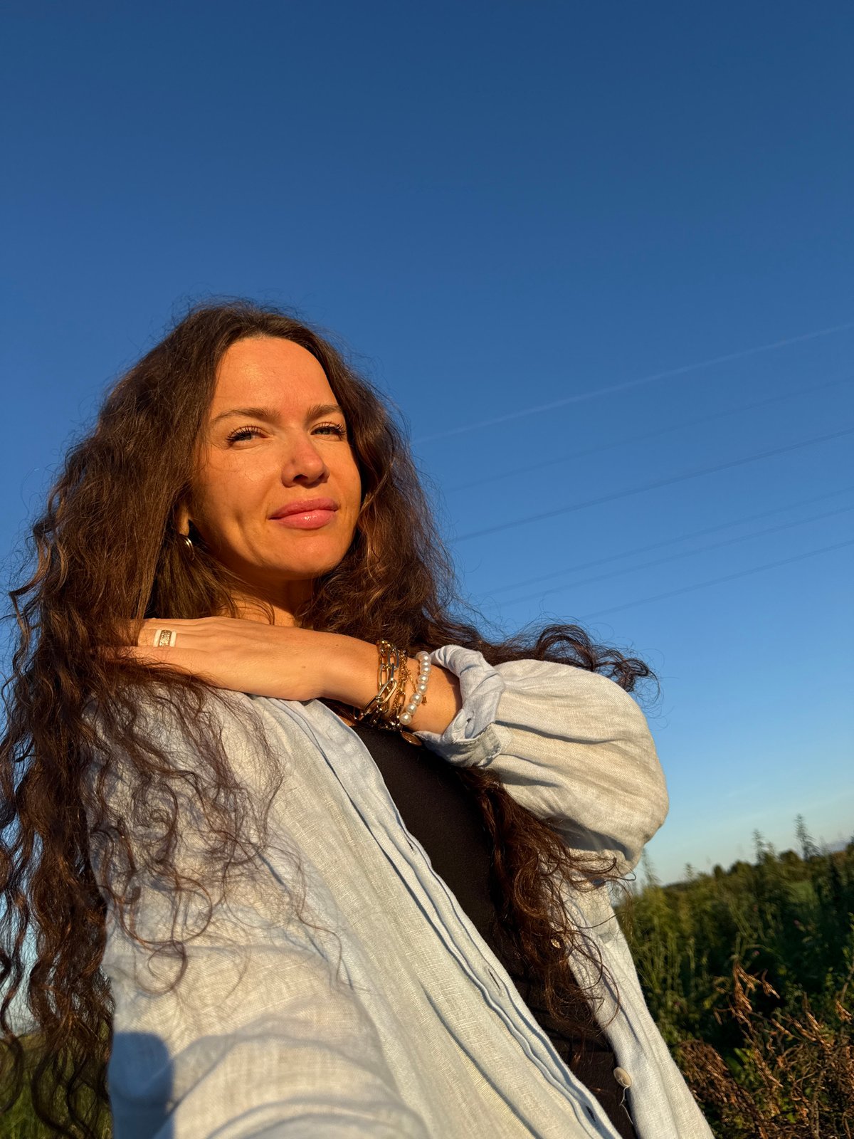 Golden hour in a Turinsk meadow, wildflowers and selfies