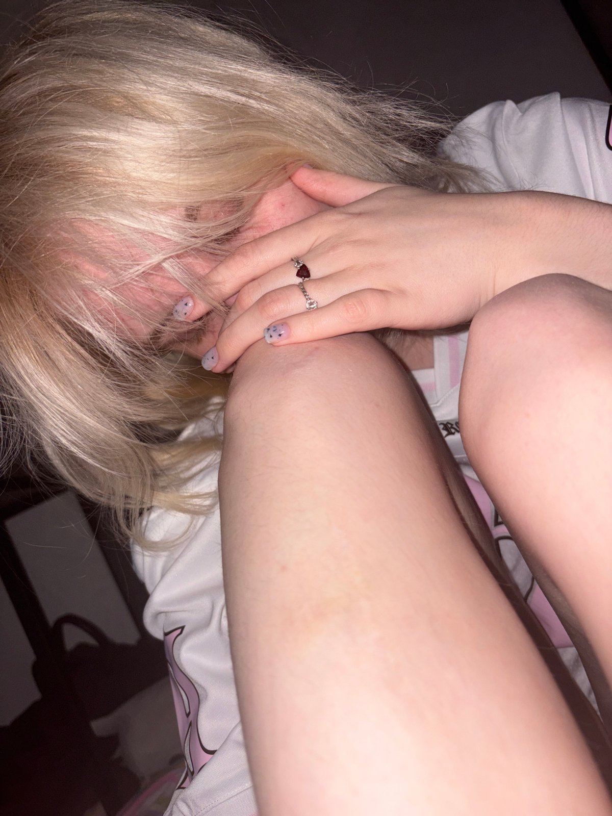 Late-night hang with a pink unicorn and a Reckless tee