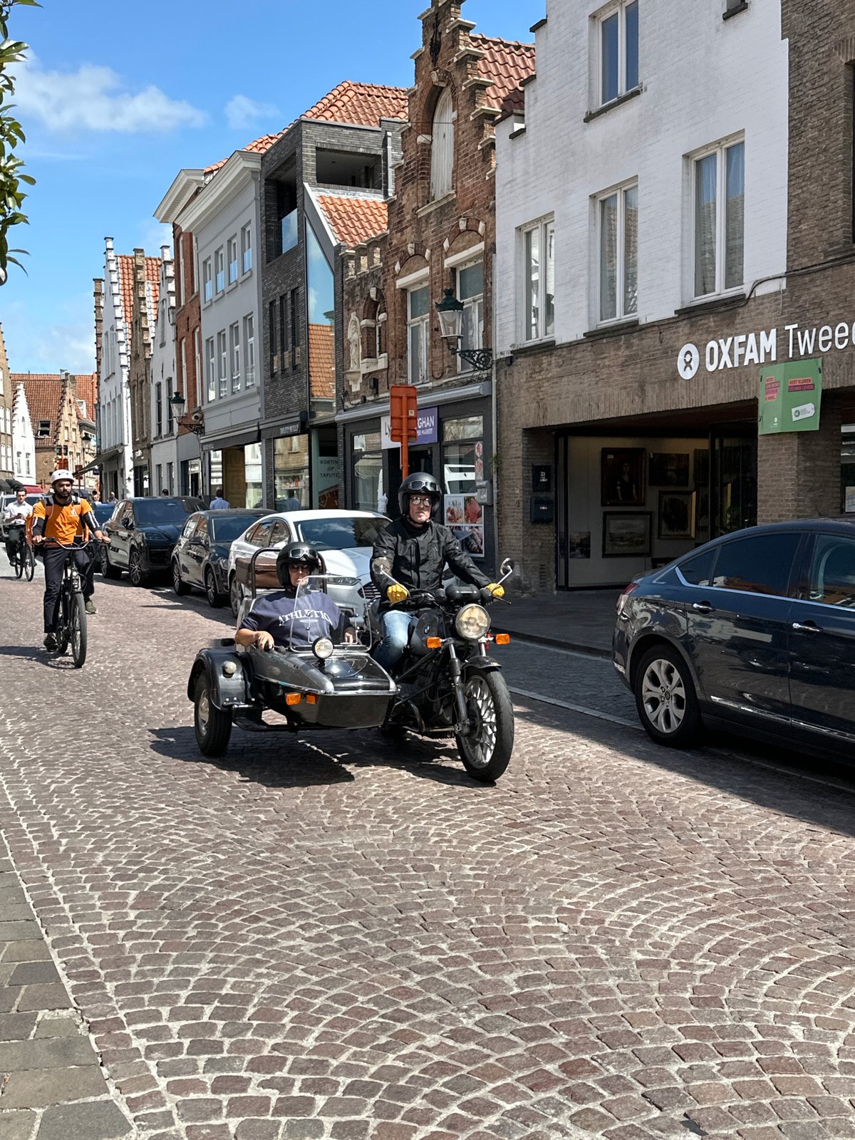 Snapshots of Bruges: streets, shops, and a lily pad canal
