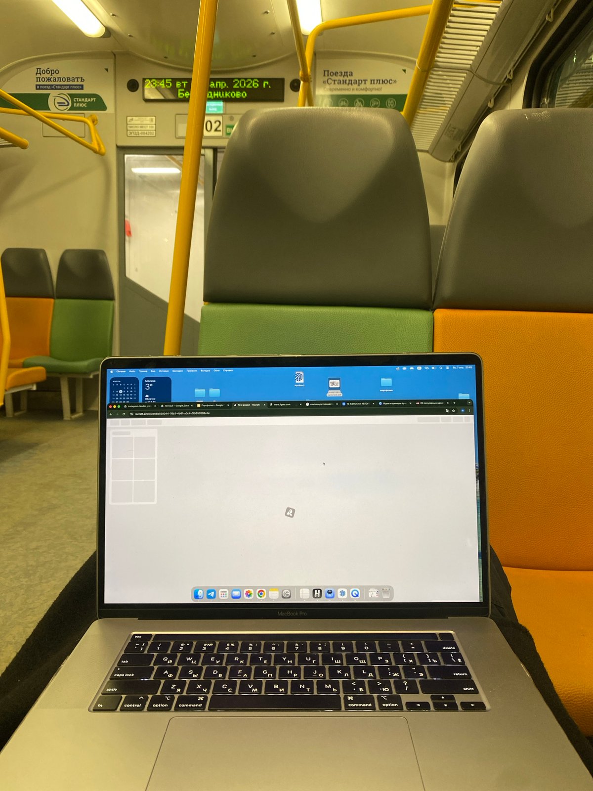 Laptop spotted on Moscow train seat during evening commute