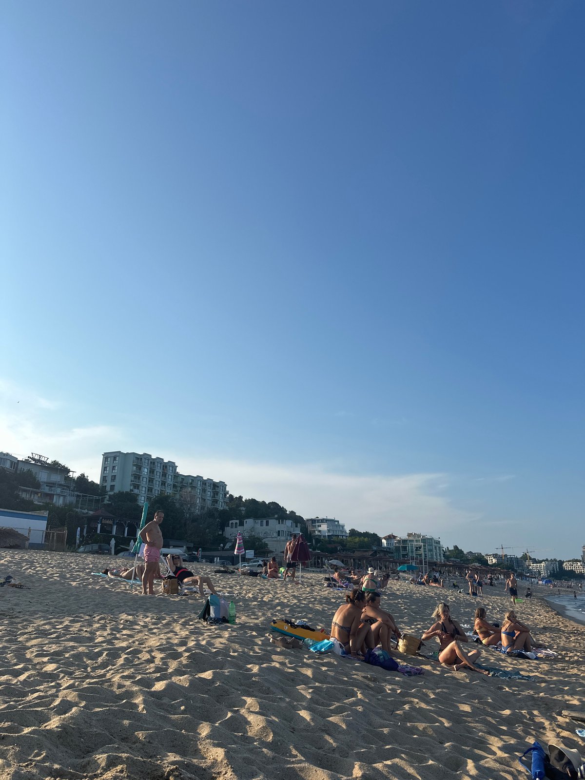Beach afternoon to dusk, paddleboarding and sunset views