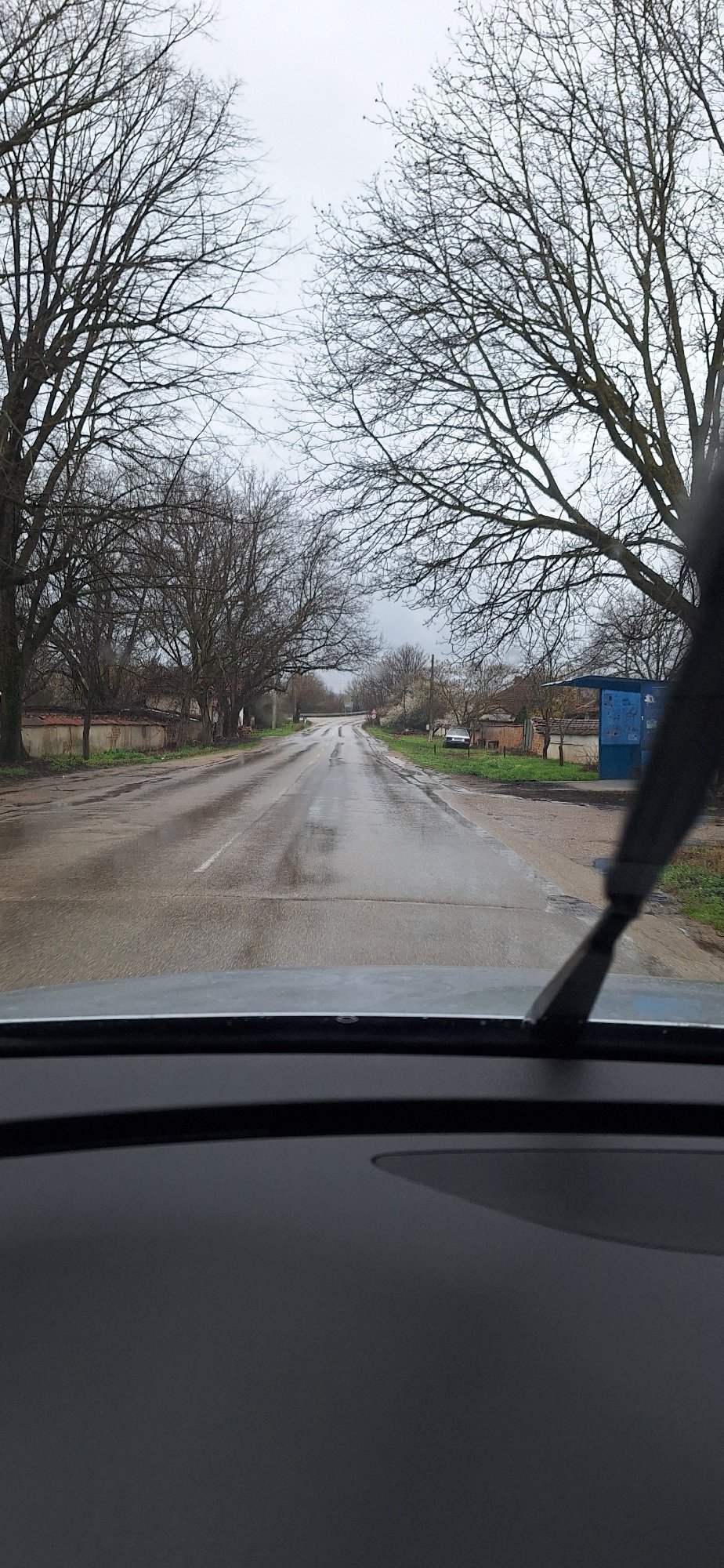 Wet road scene documented in Ioglav, Bulgaria