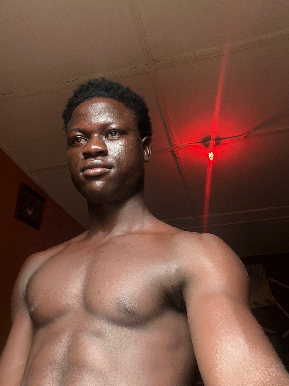 Man photographed indoors across Nigerian locations during morning timeframe