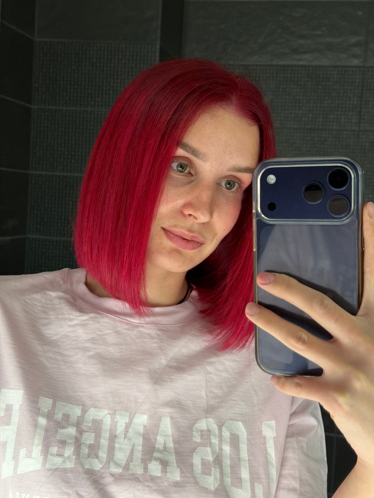 Woman takes selfie with smartphone in Chaikovsky, Russia