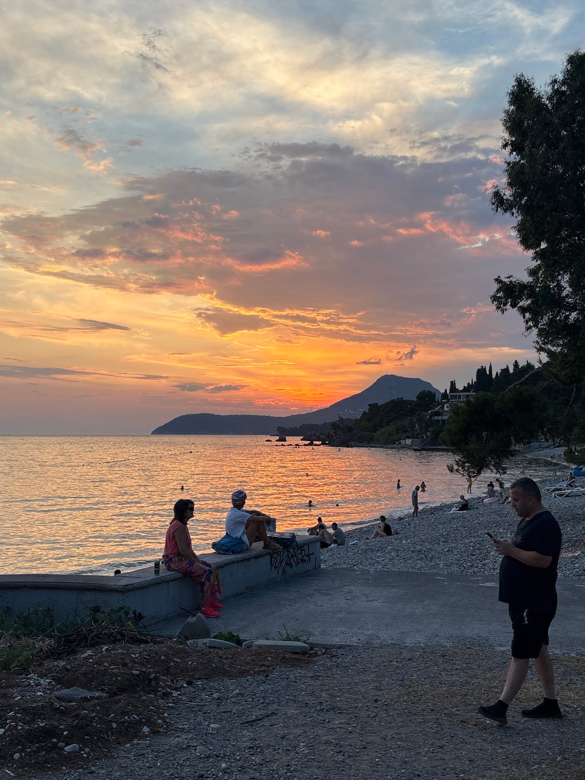 Summer solstice sunset on Bar's Adriatic pebble beach