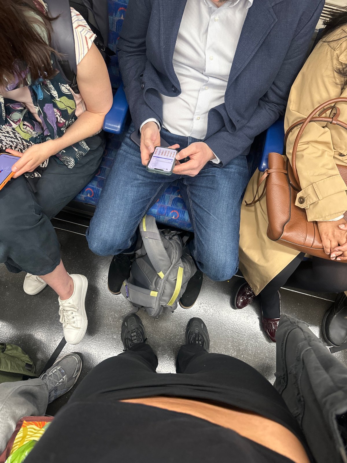 Morning commute captured on crowded London transport in Southwark