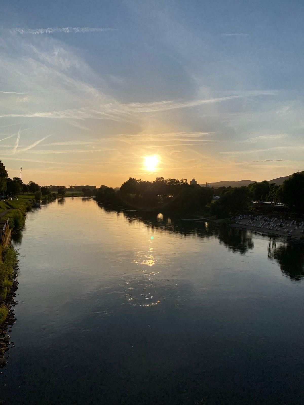 Sunset along the Weser riverfront in Rinteln, Germany