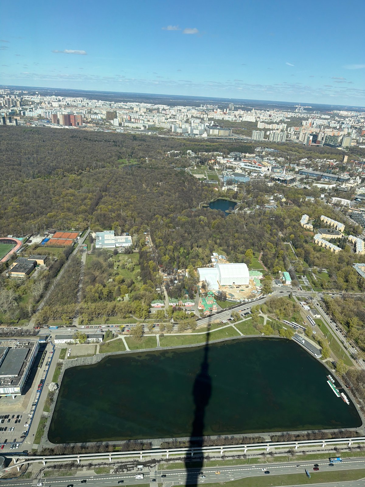 Aerial view documents Khimki's rectangular lake near highway