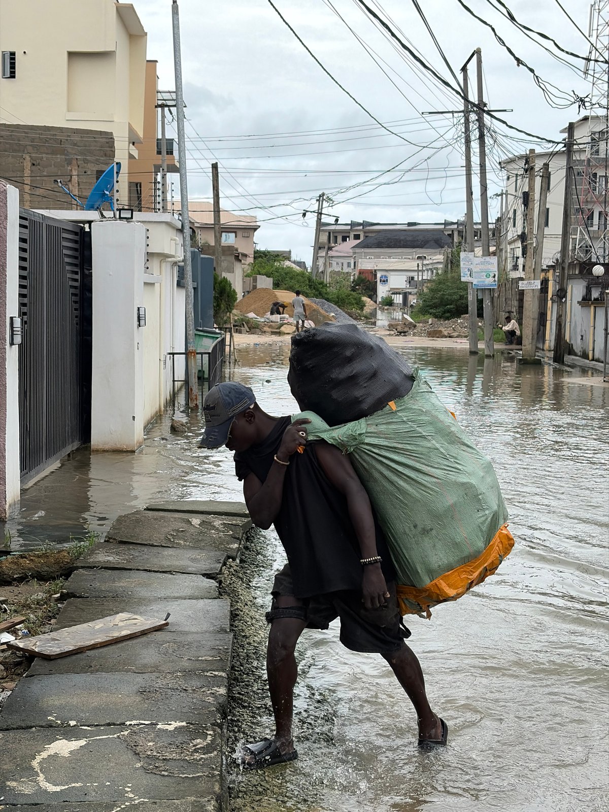 Igboefon residents navigate flooded streets as daily life continues