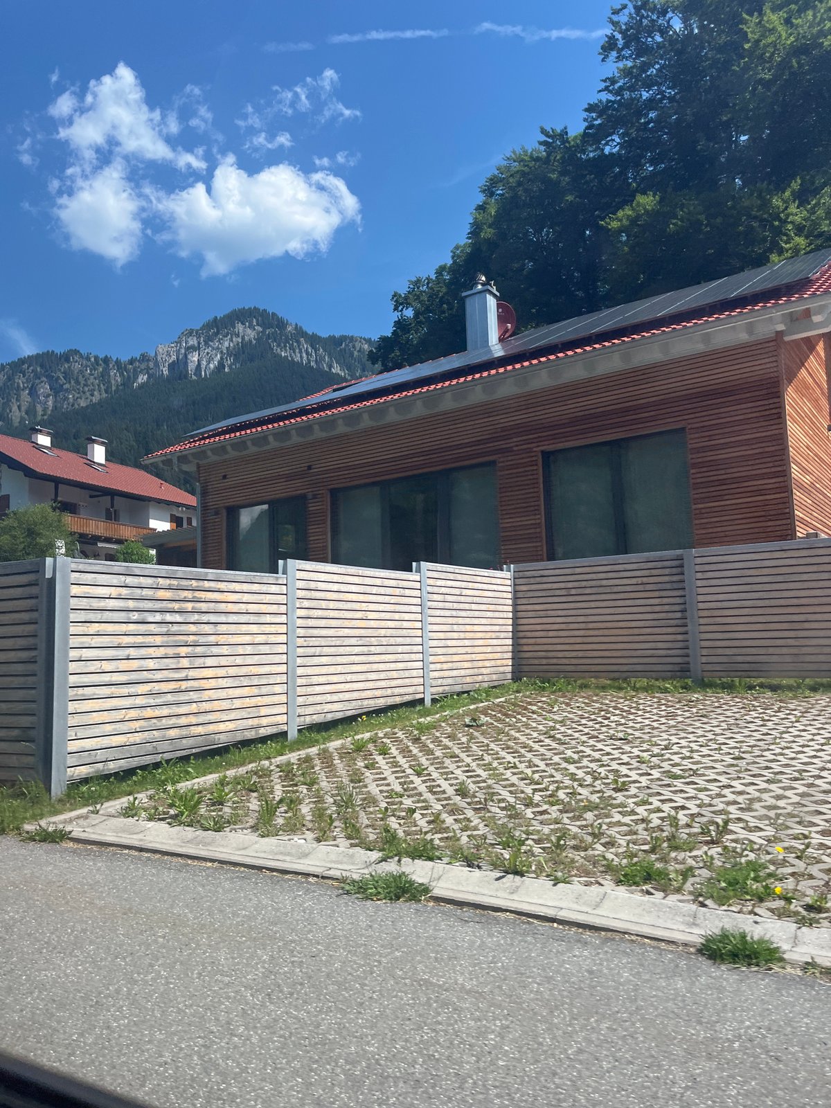 Passing through Oberau's Alpine streets on a summer morning