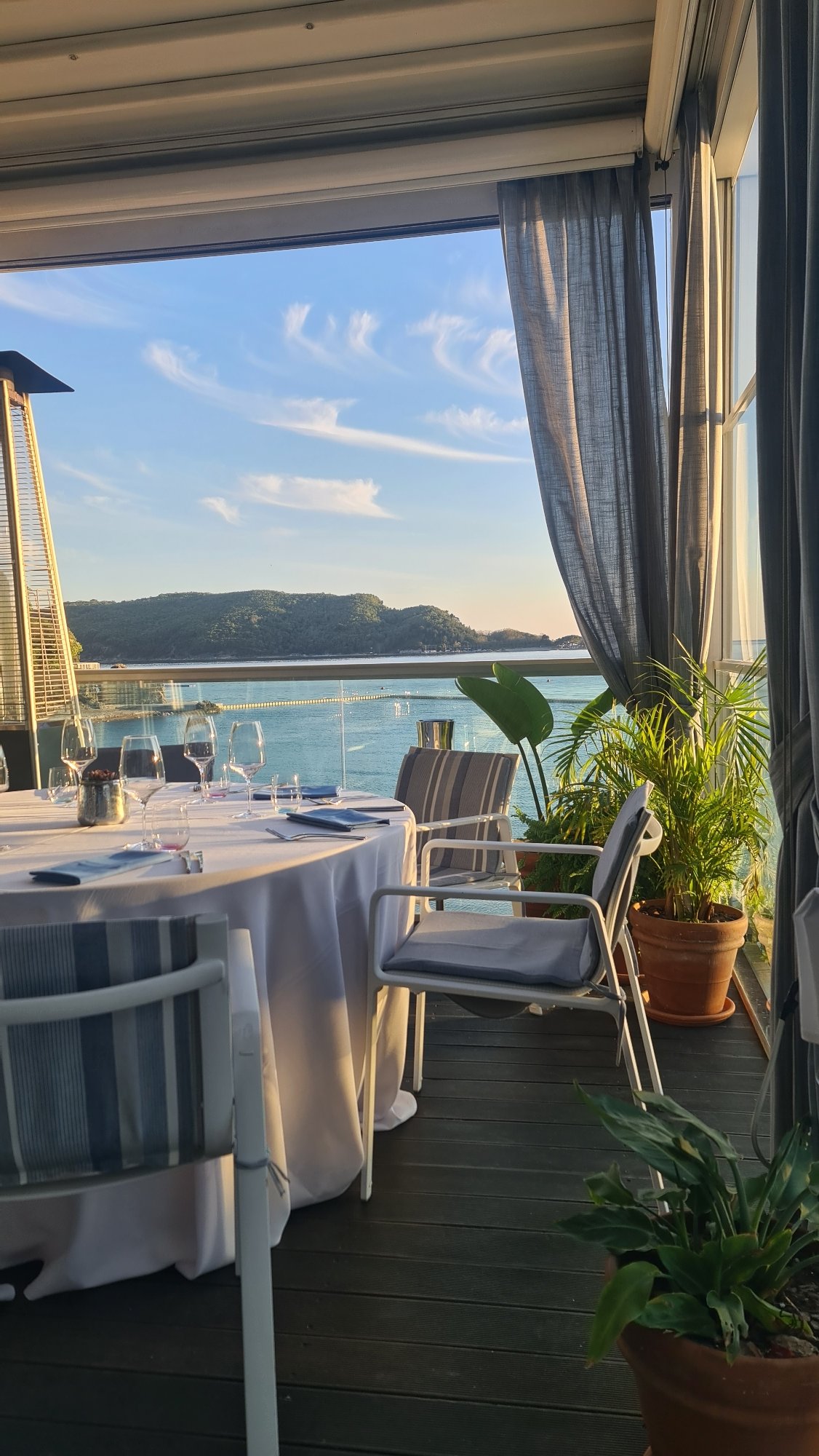 Coastal dining captured at scenic Budva restaurant terrace