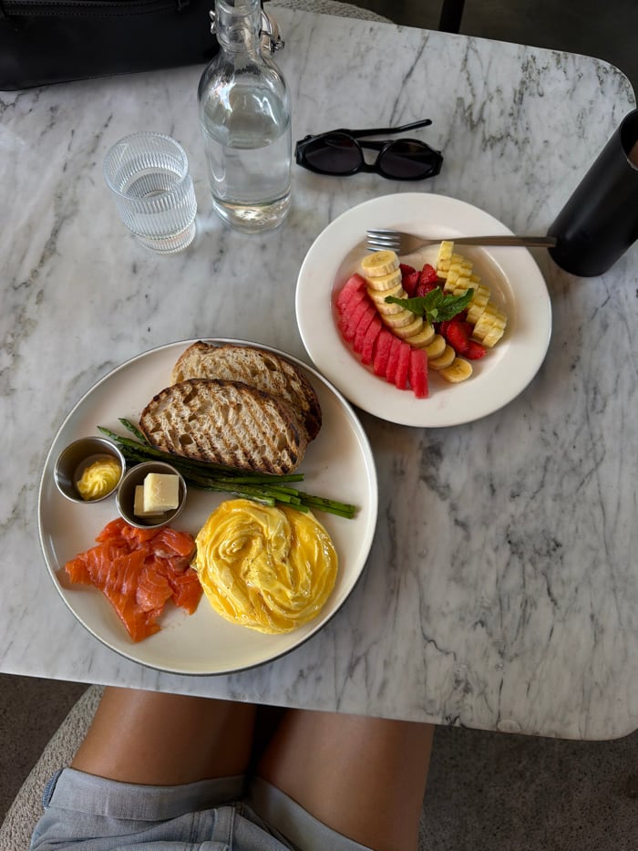 Fruit breakfast served on marble table in Tibubeneng