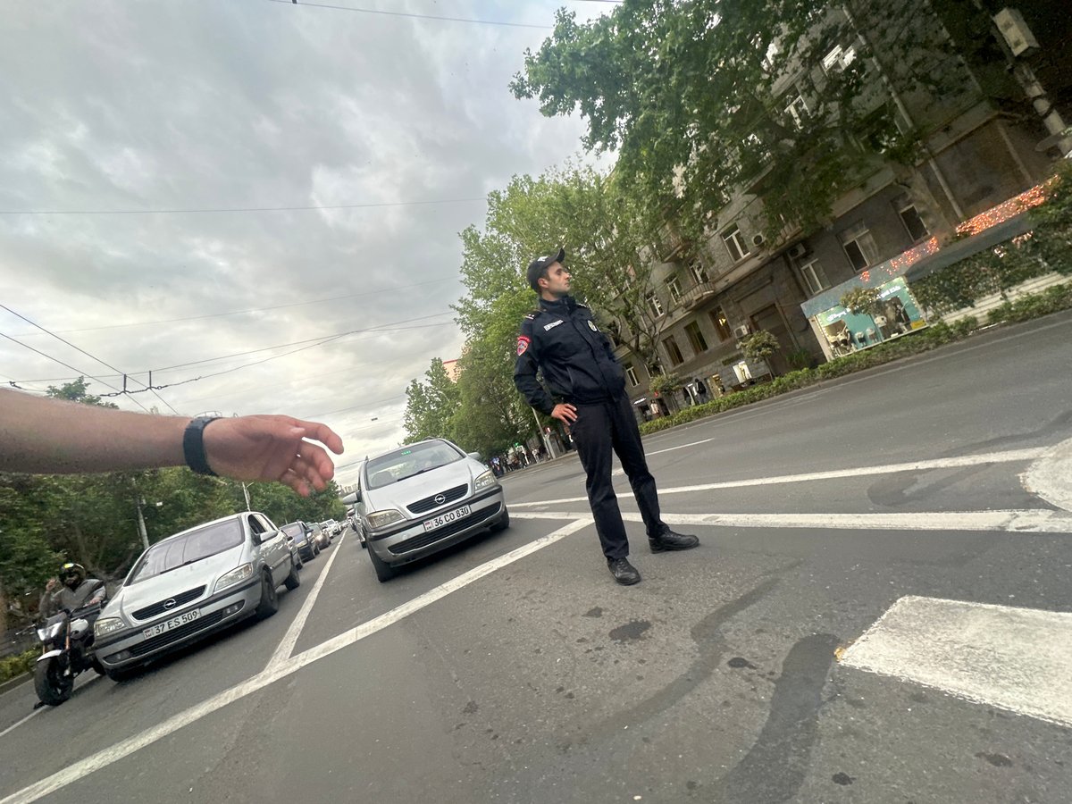Ordinary street life documented across Yerevan during afternoon hours