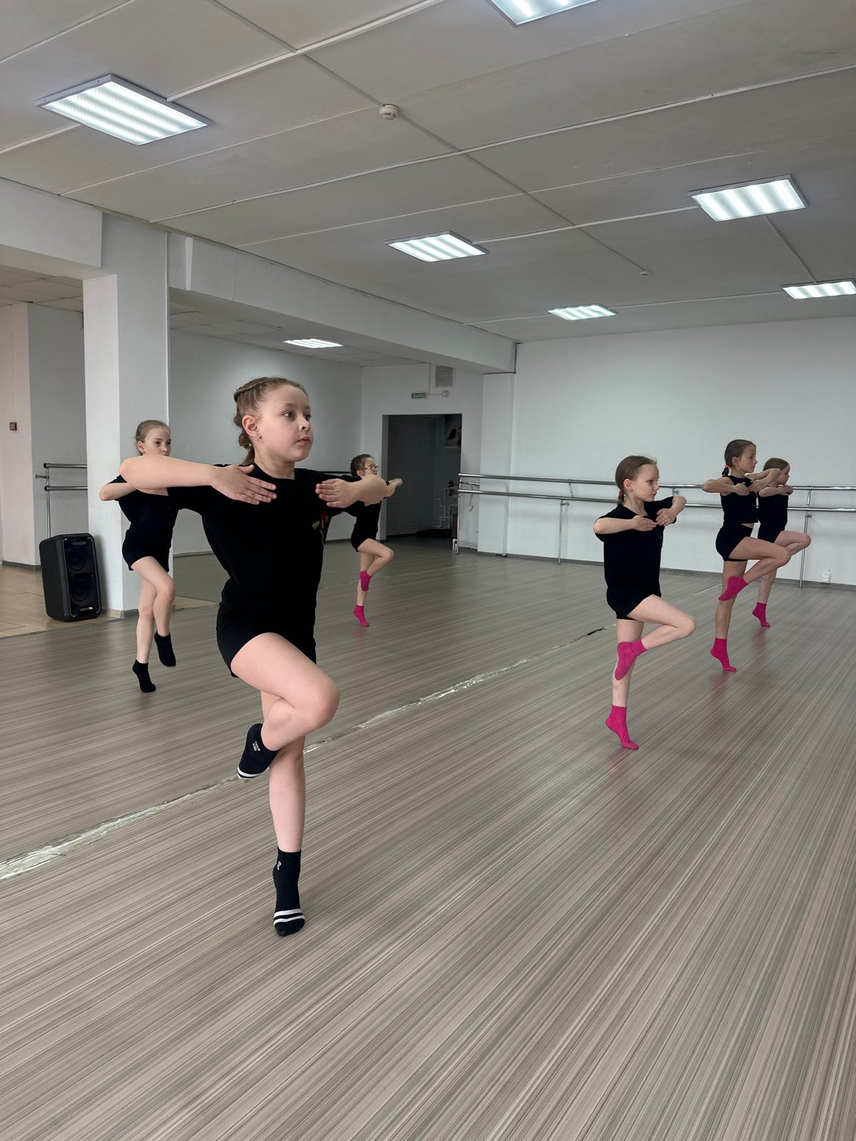Young dancers practice floor exercises in Votkinsk studio