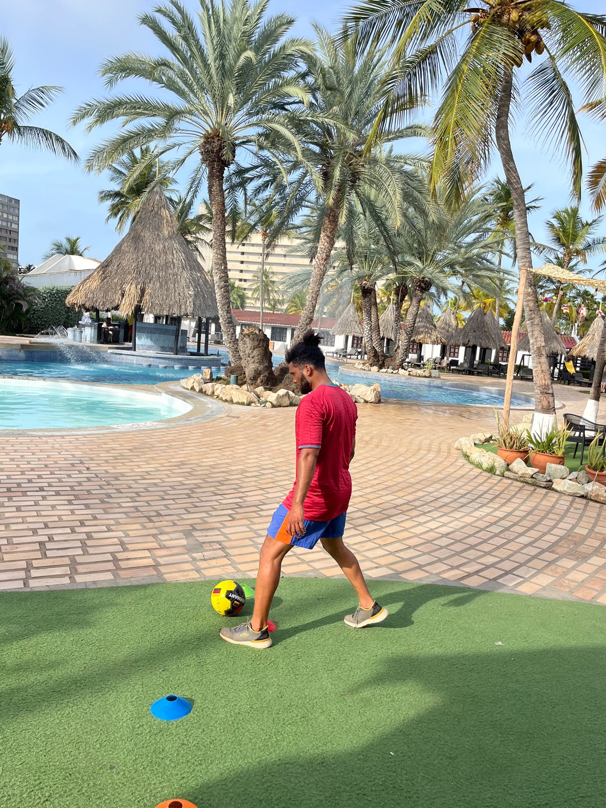 Resort evening in Porlamar: soccer, dancing, and poolside hangs