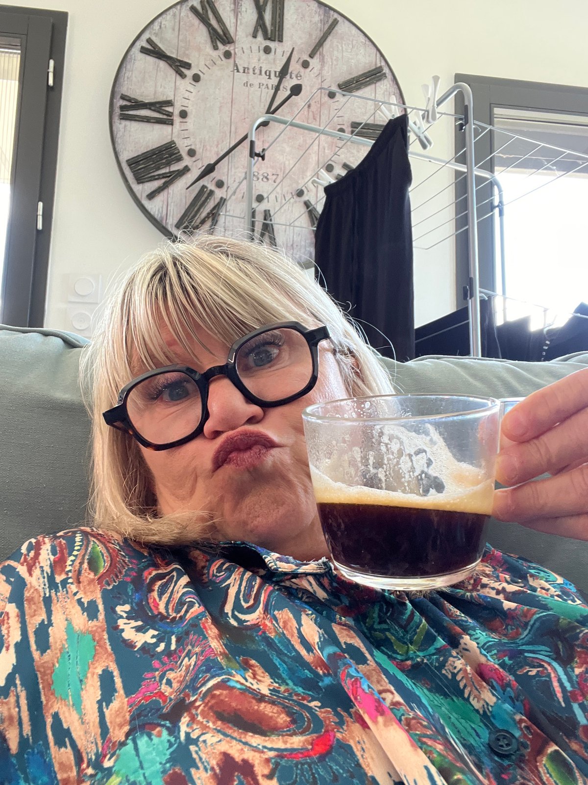 Woman enjoys leisurely morning meal preparation in French home