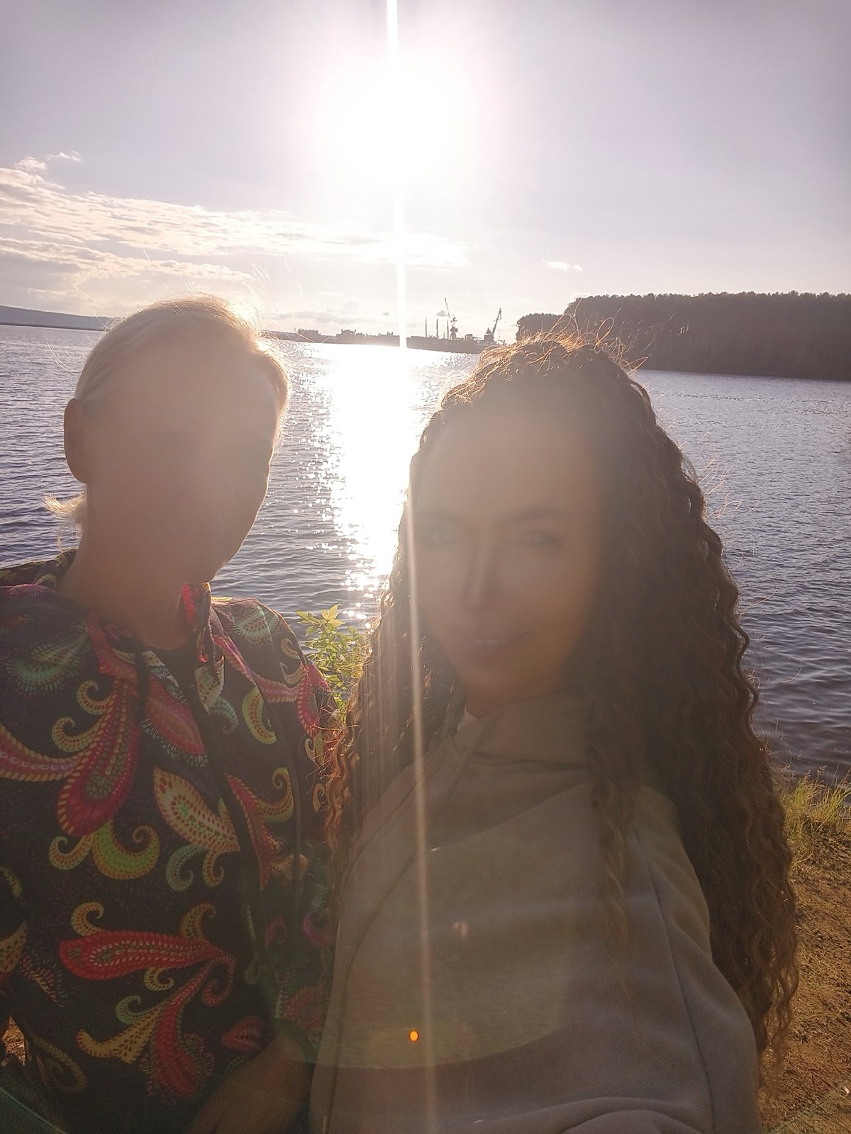 Sunny afternoon waterfront gathering near cruise ships documented