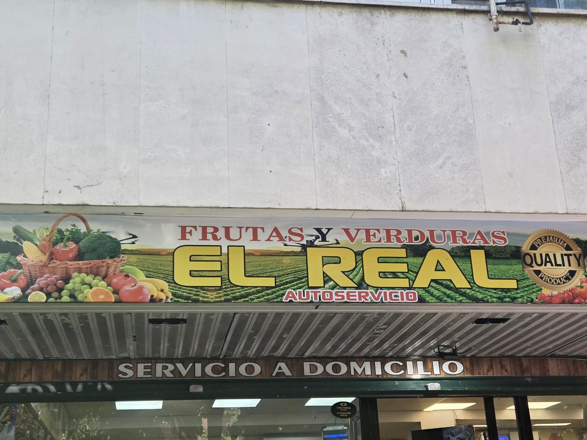Mixed retail and banking strip in suburban Collado Villalba