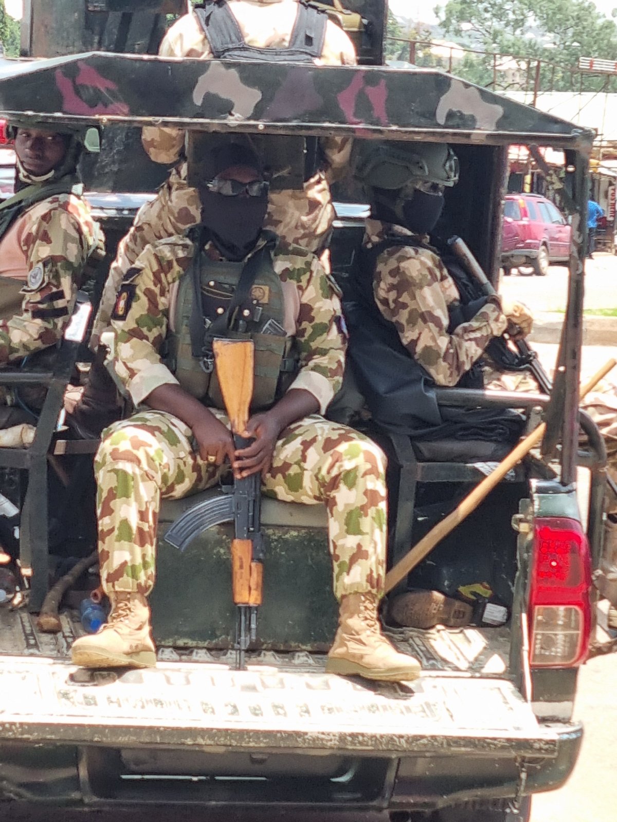 Everyday life across Jos streets, shops, and landmarks
