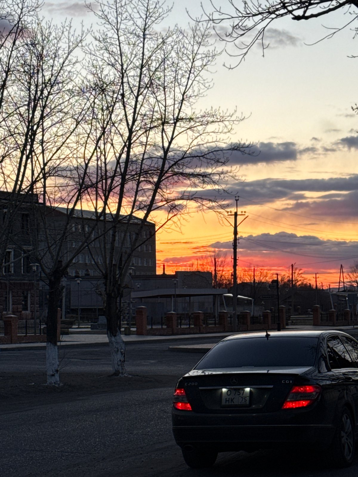 Evening scenes captured around Borzya, Russia including dog, cinema