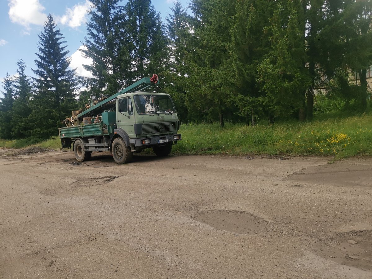 Crane truck spotted on damaged rural road in Zhivkovo