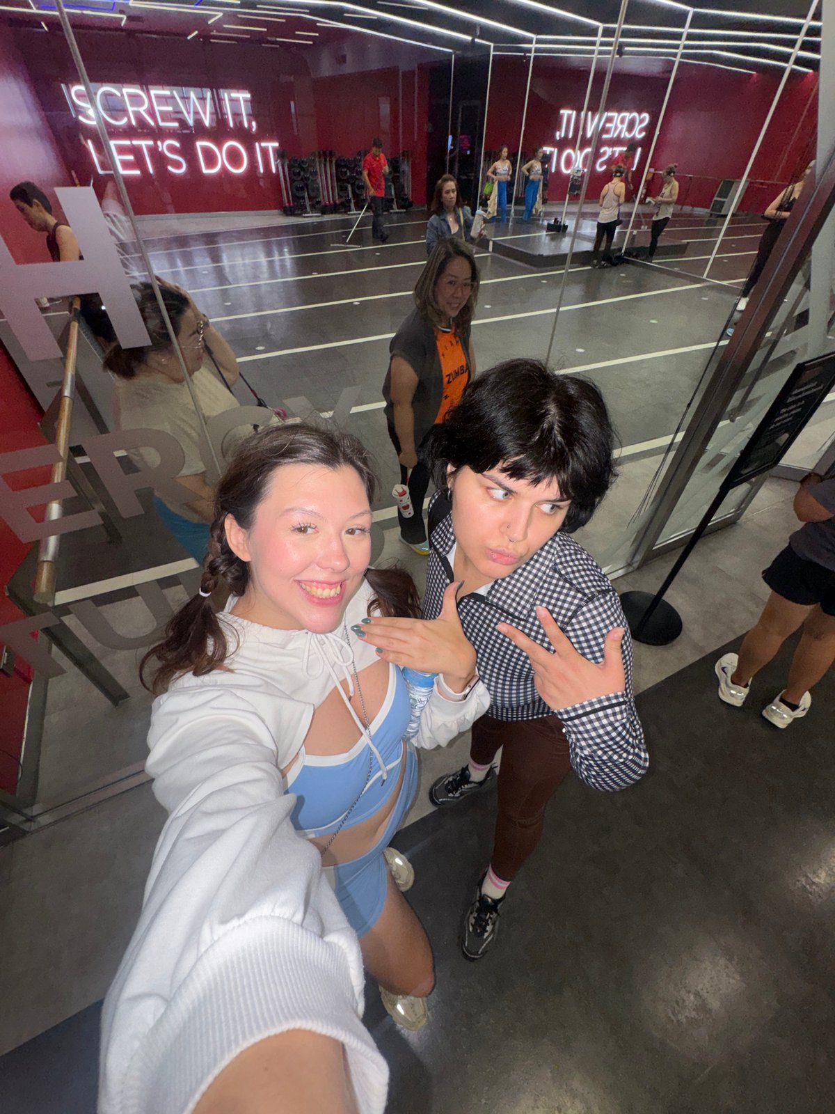 Group fitness session in a mirrored studio, Chiang Mai