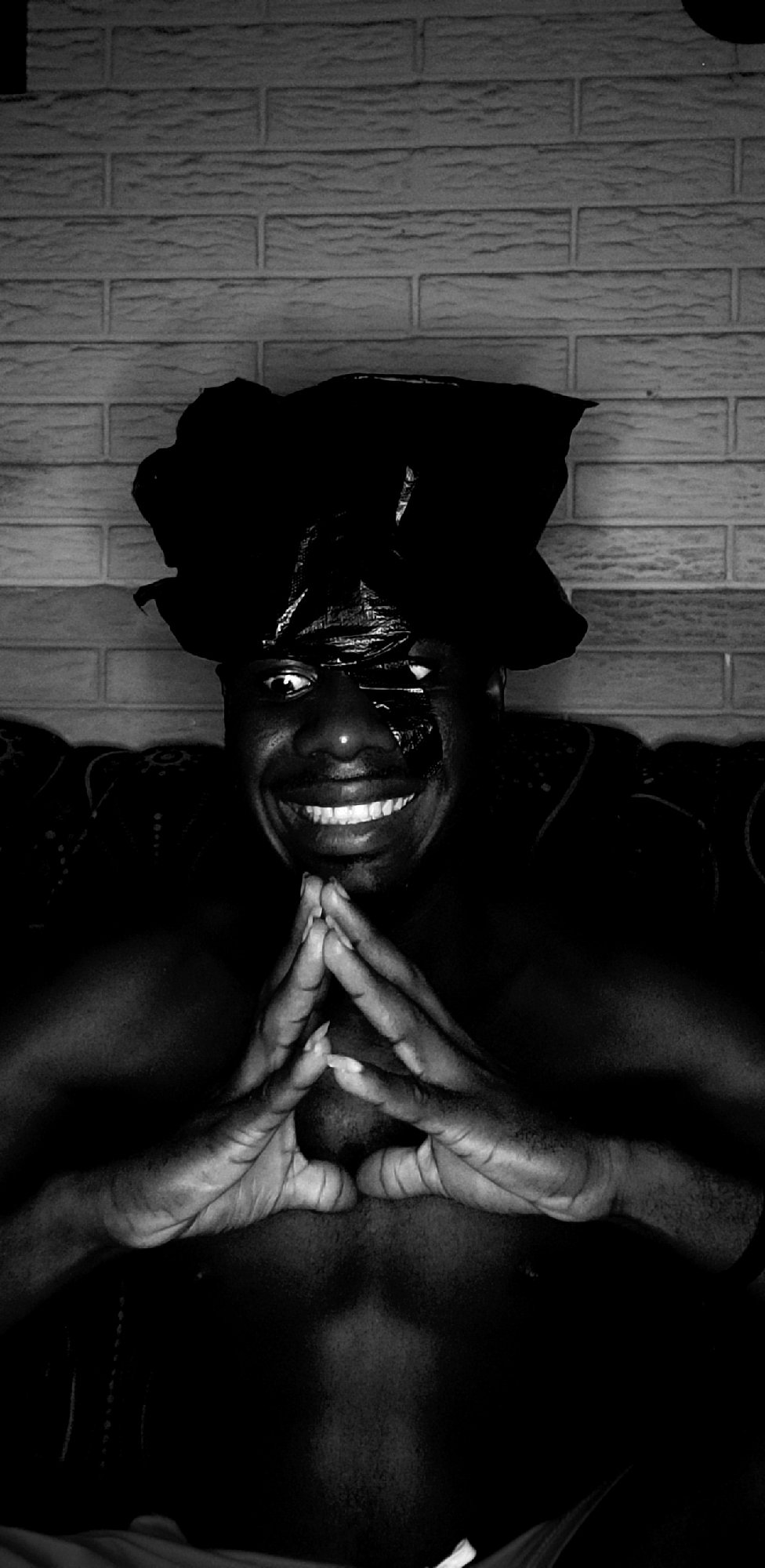 Person photographed in contemplative poses in Narayi, Nigeria