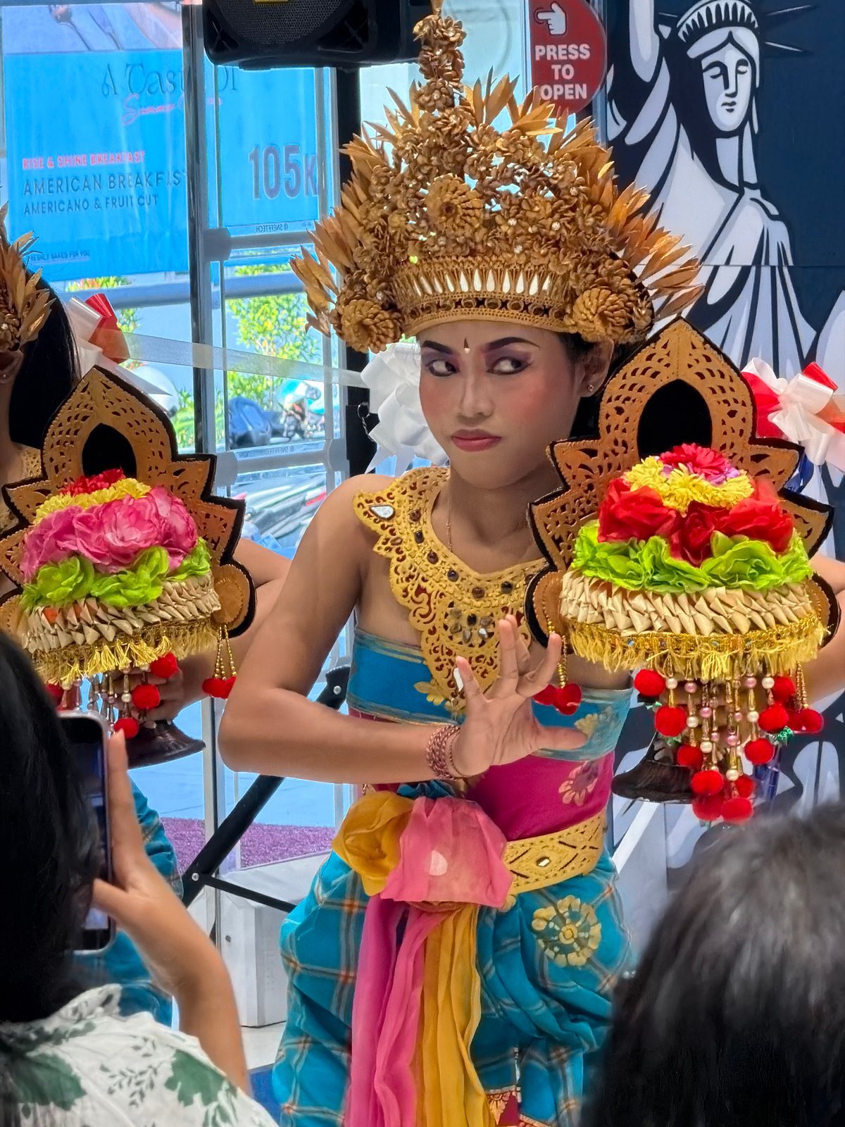 Traditional Balinese dance performance in North Kuta, with a seafood aside