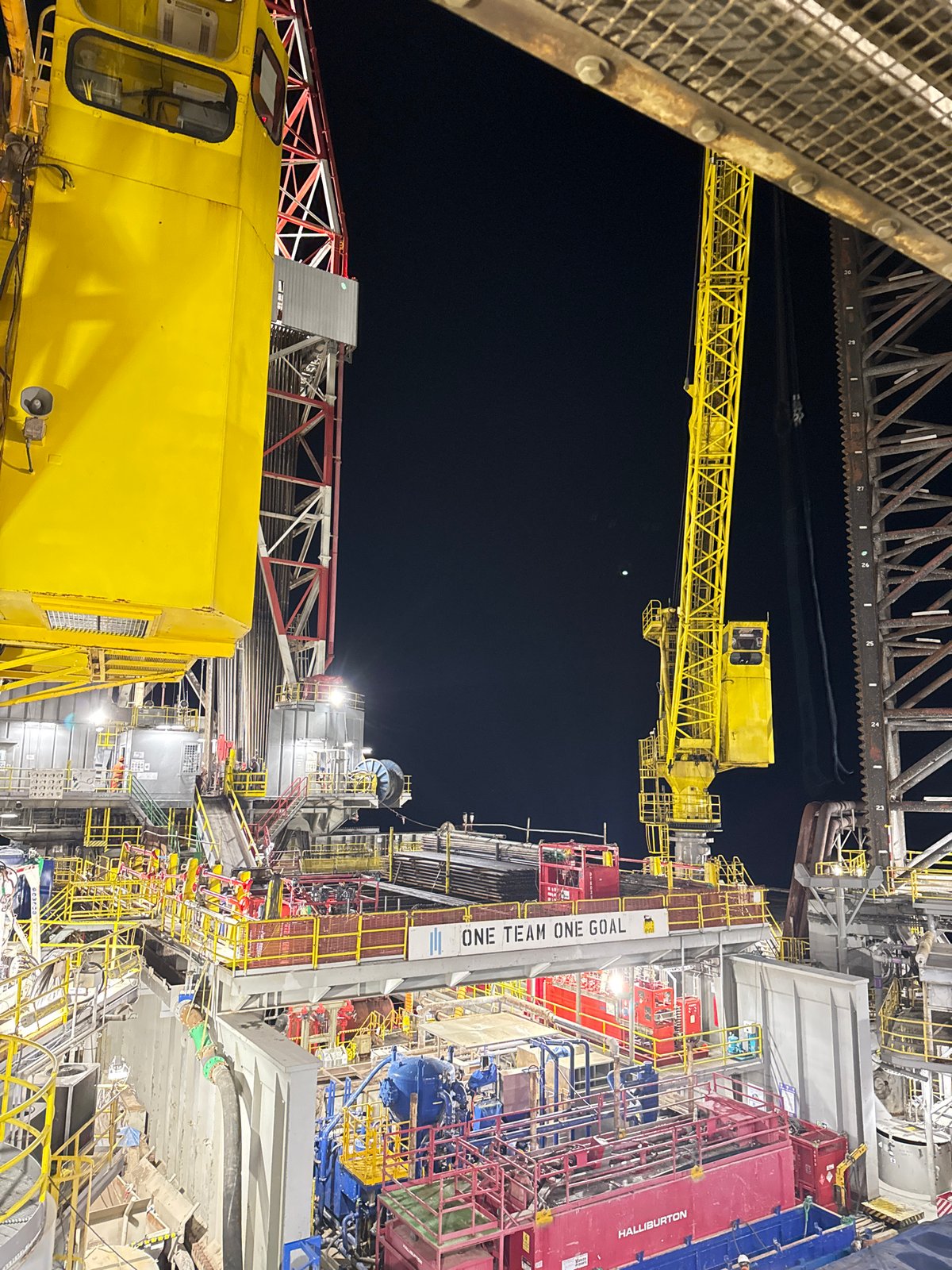 Industrial oil rig facility observed at night in Italy