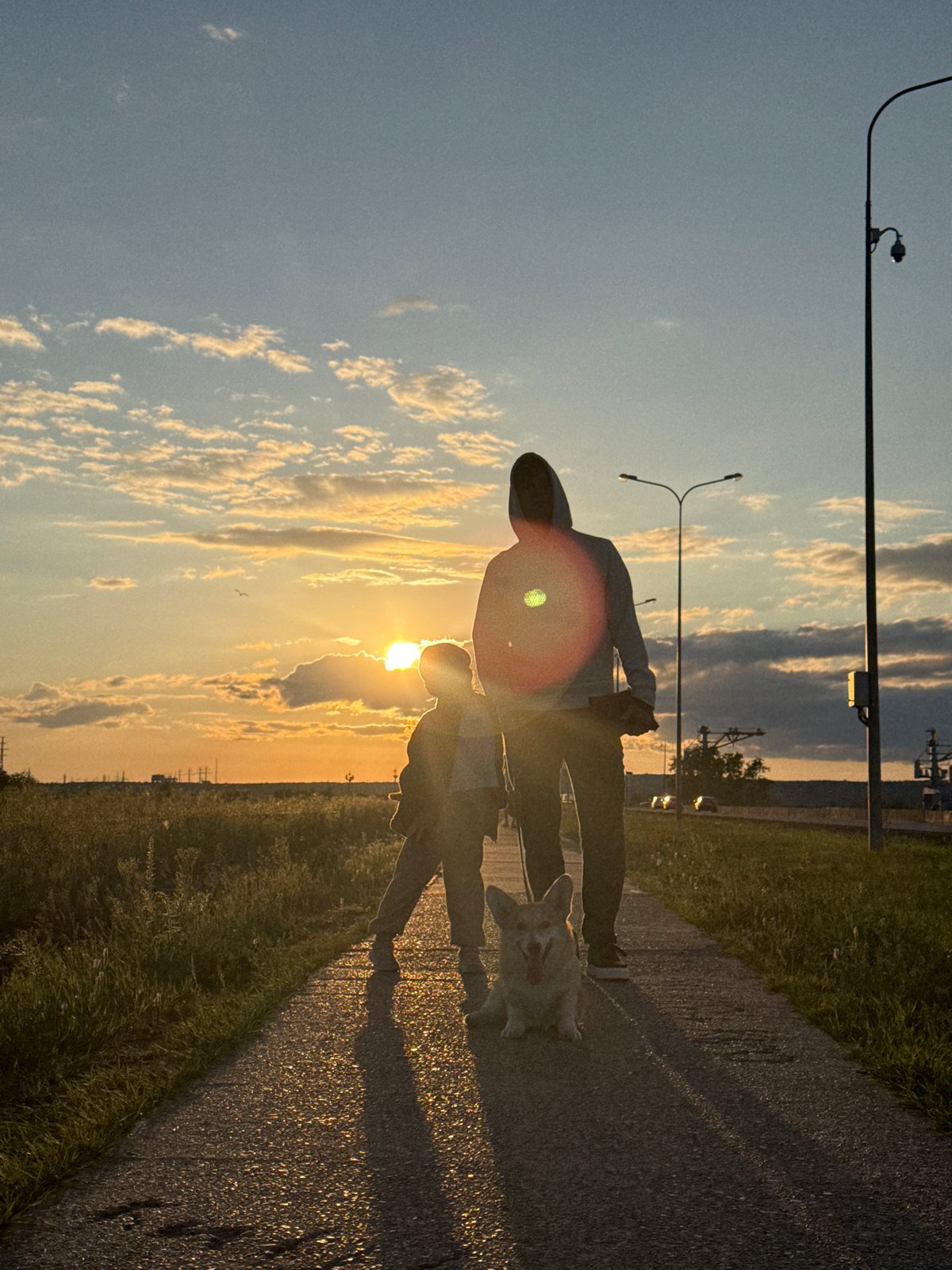 Sunset gathering documented along Kama River waterfront in Chaikovsky