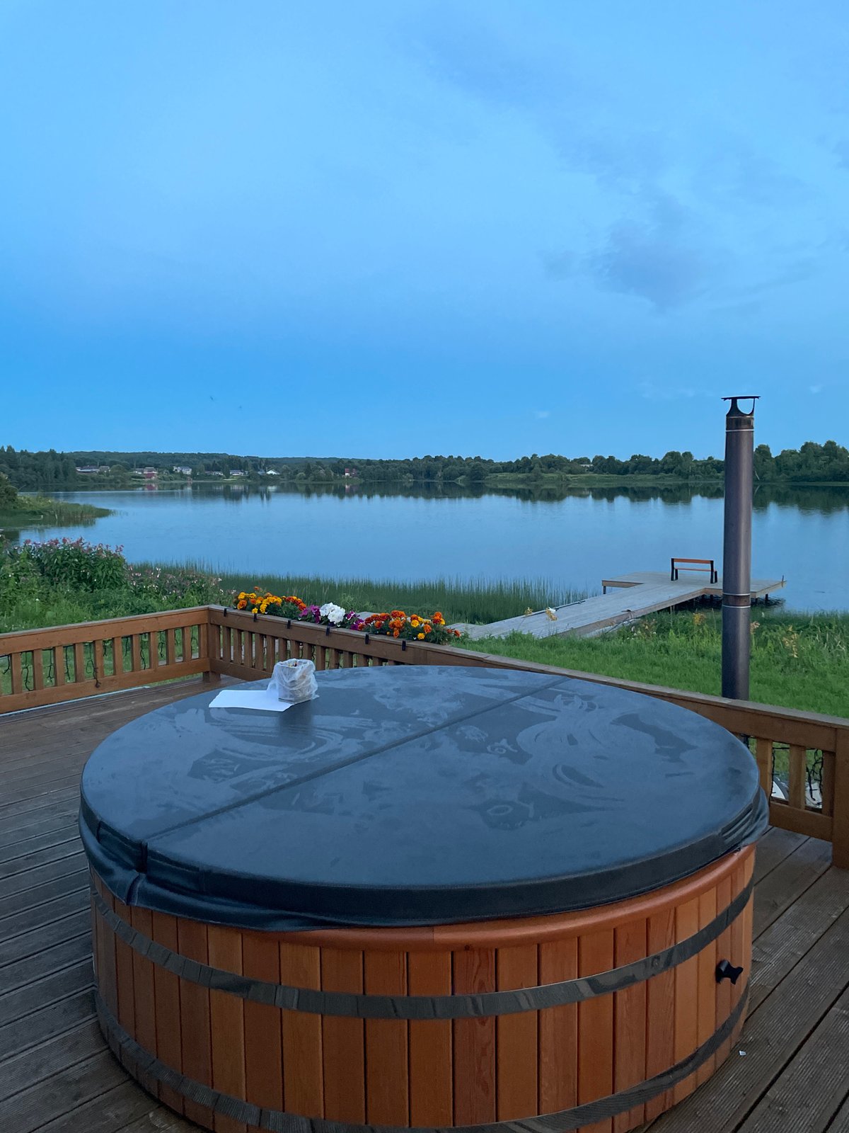 Midsummer evening on a lakeside deck in Karelia