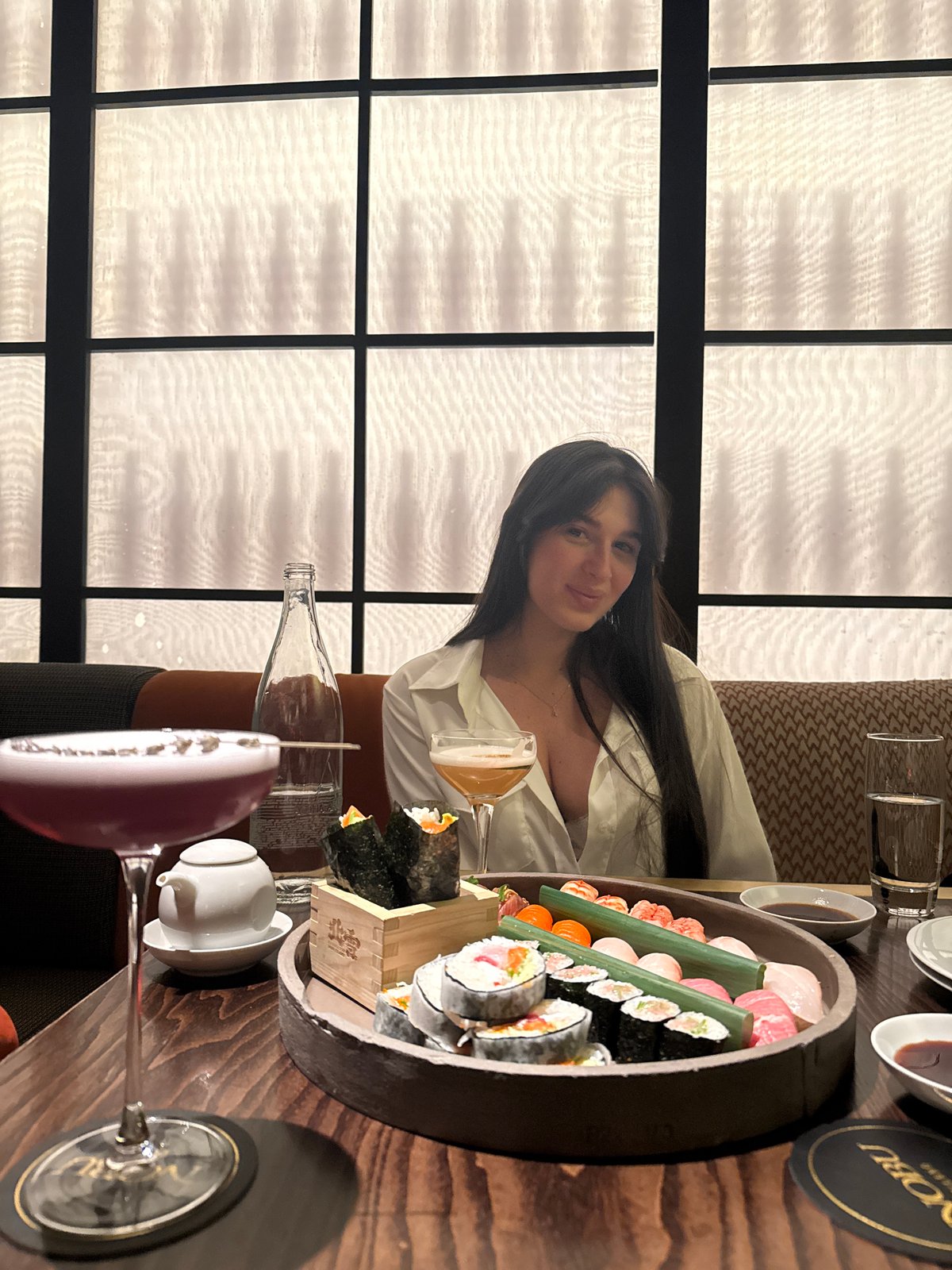 Couple enjoys sushi dinner at upscale Japanese restaurant in Milan