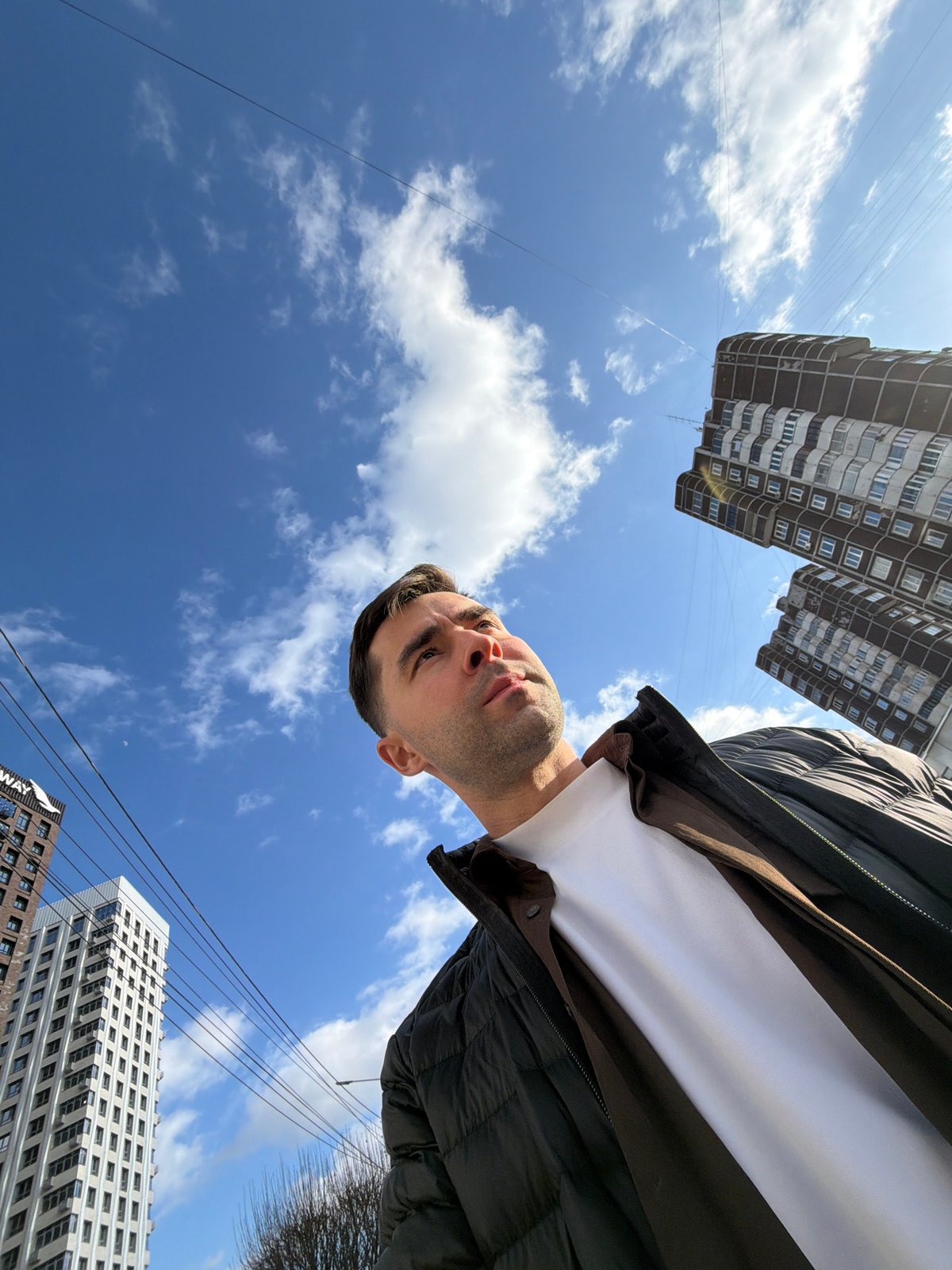 Man documents morning walk through downtown Krasnoyarsk with selfies