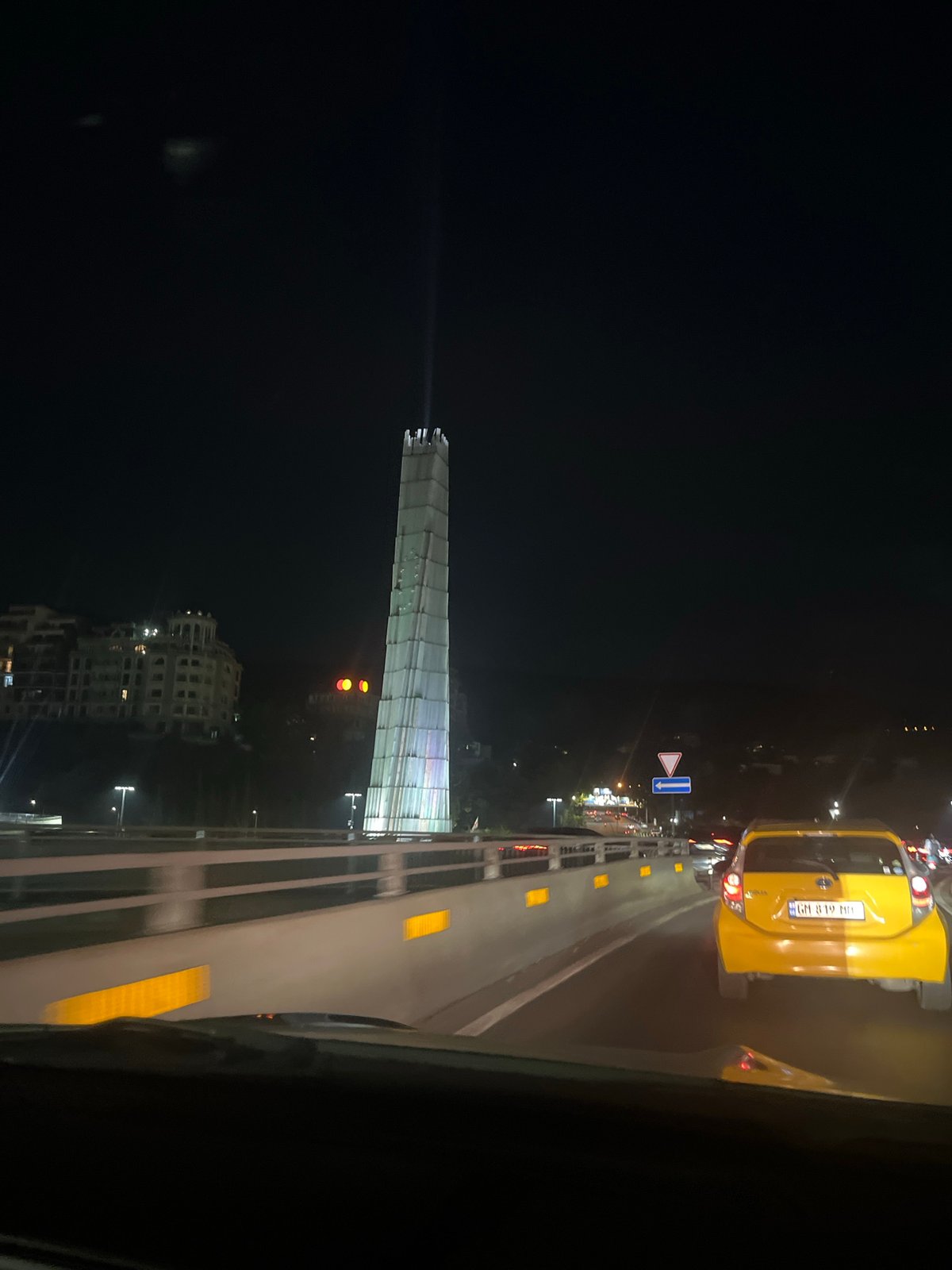 Driving through Tbilisi at night, fog and city lights