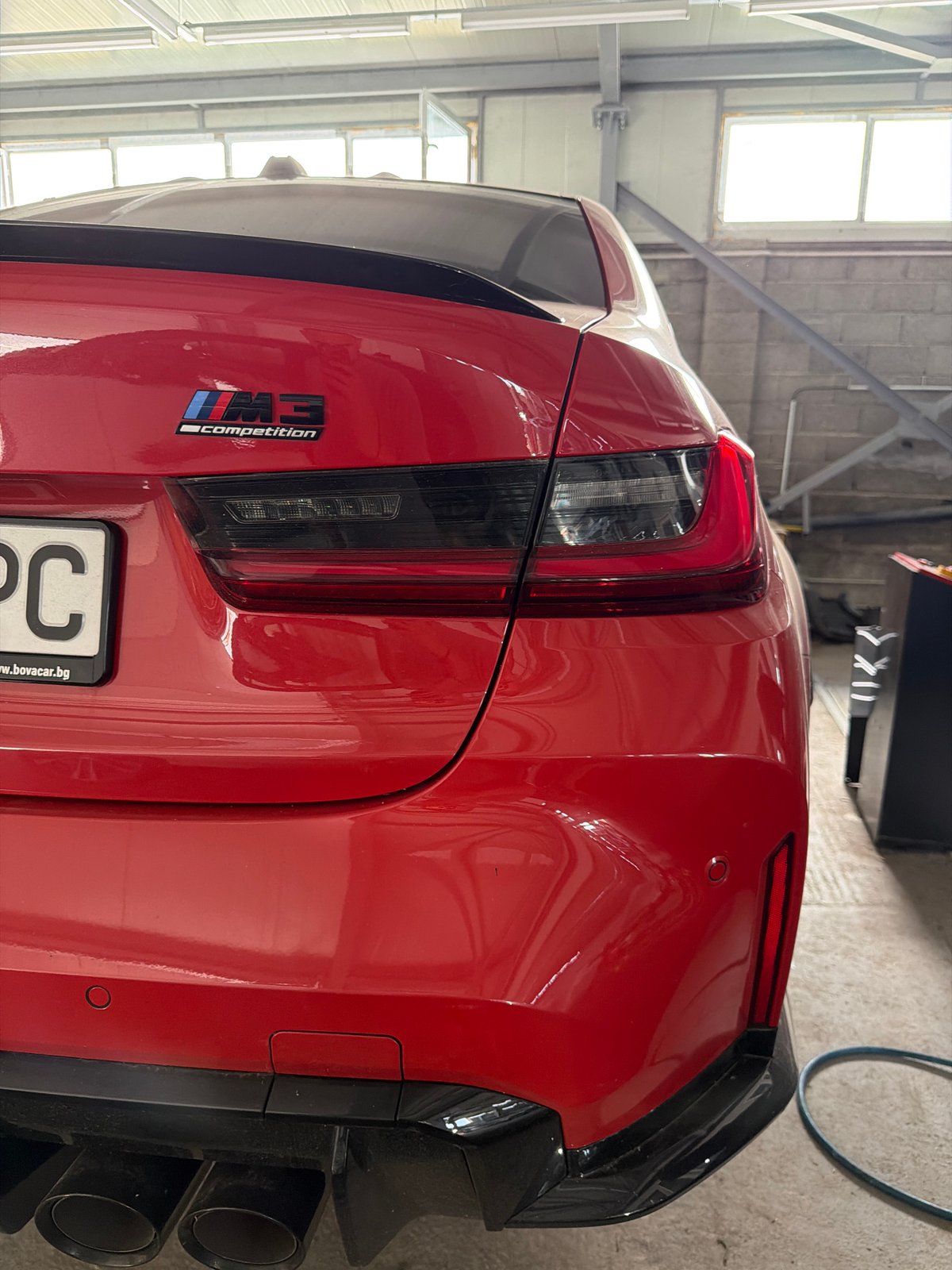 BMW workshop in Burgas with several cars mid-repair