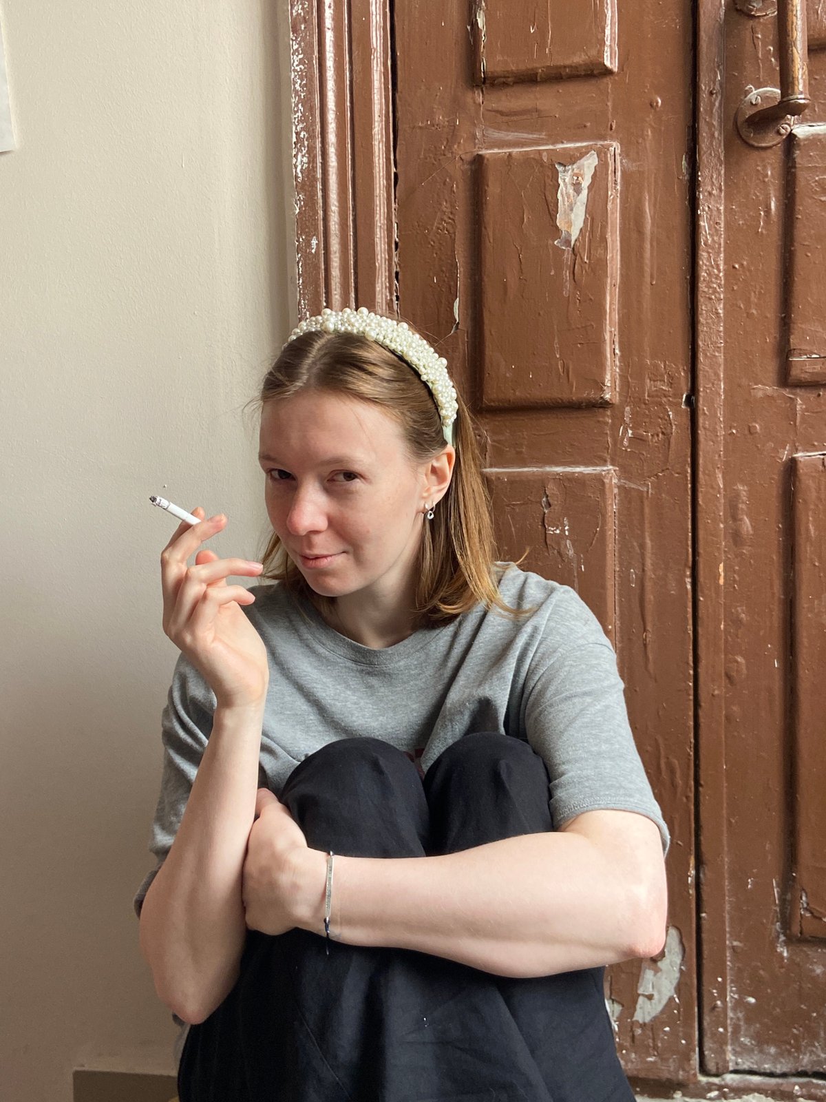 Three people photographed in separate Moscow indoor locations