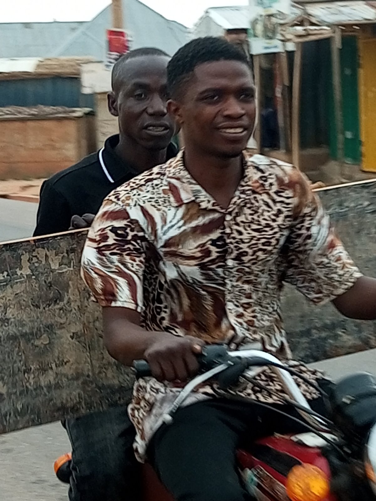 Morning street life across a small Nigerian town