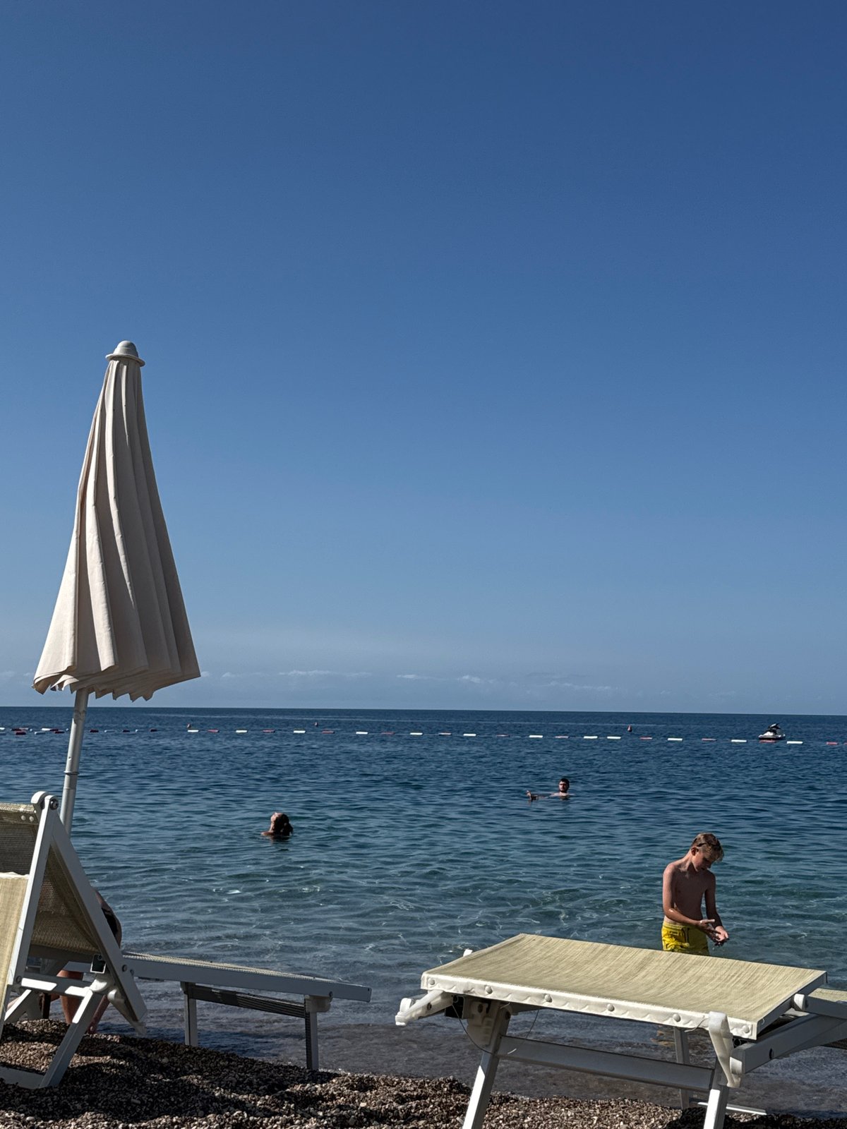 Lazy morning on the pebble beach at Kamenovo, Montenegro