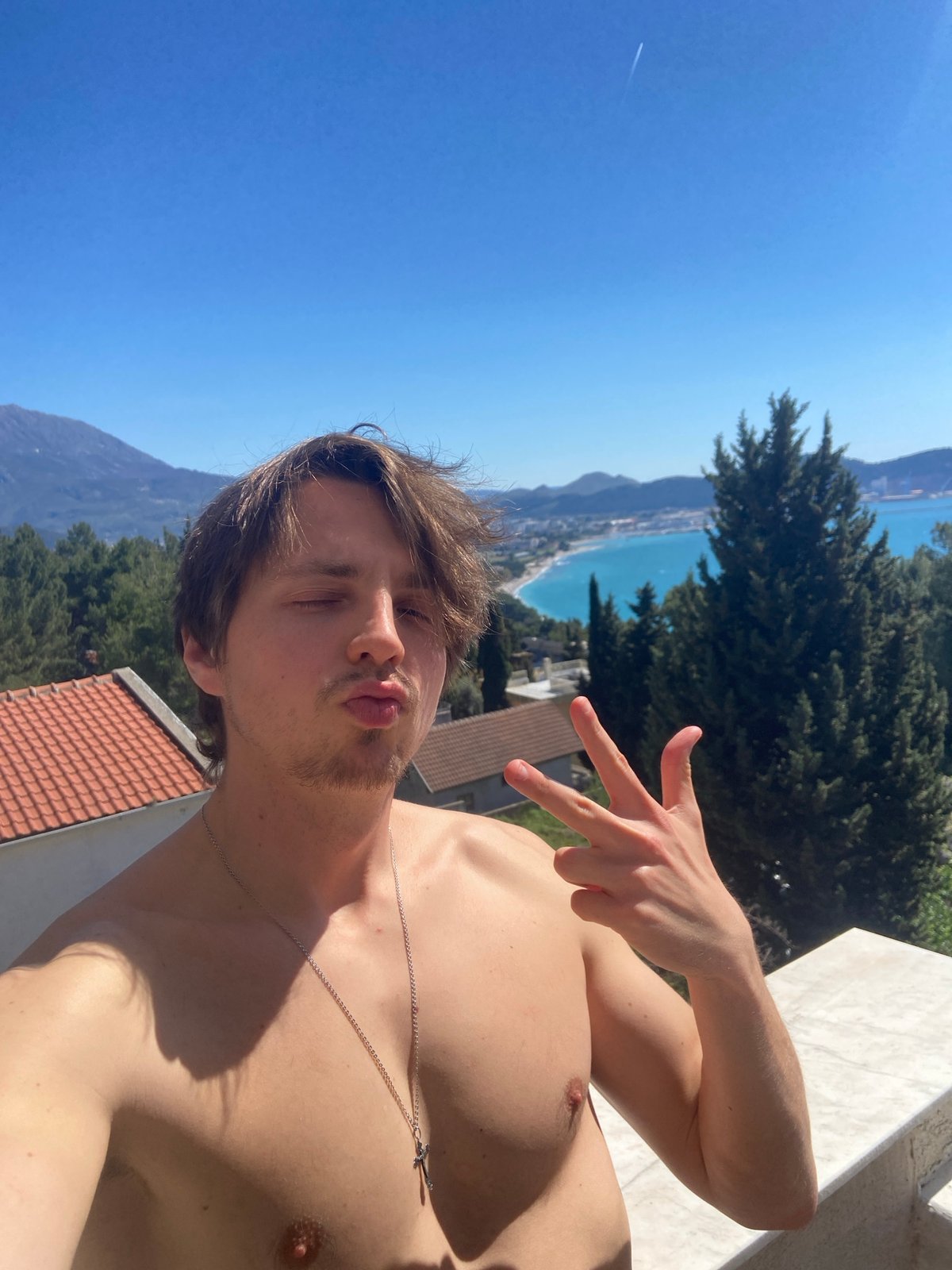 Man photographed on balcony in coastal Montenegro during Easter weekend