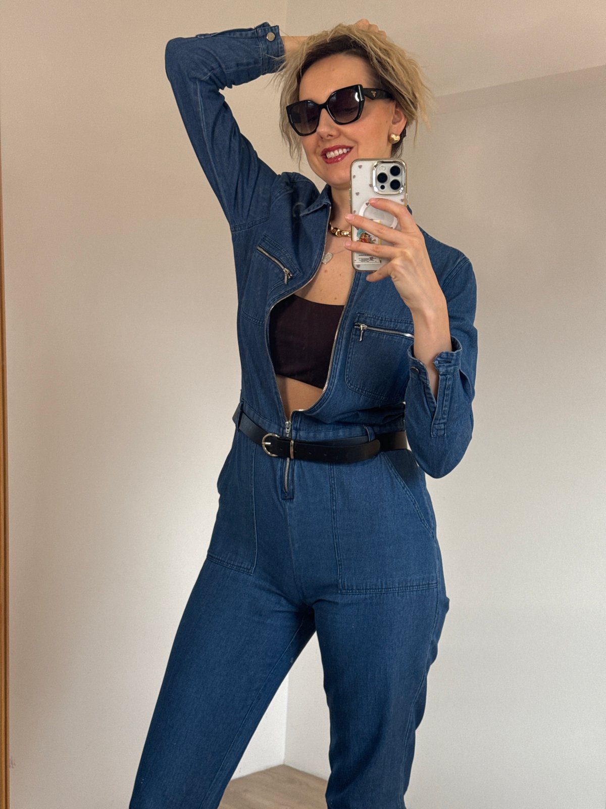 Woman takes mirror selfie series in Carnikava apartment