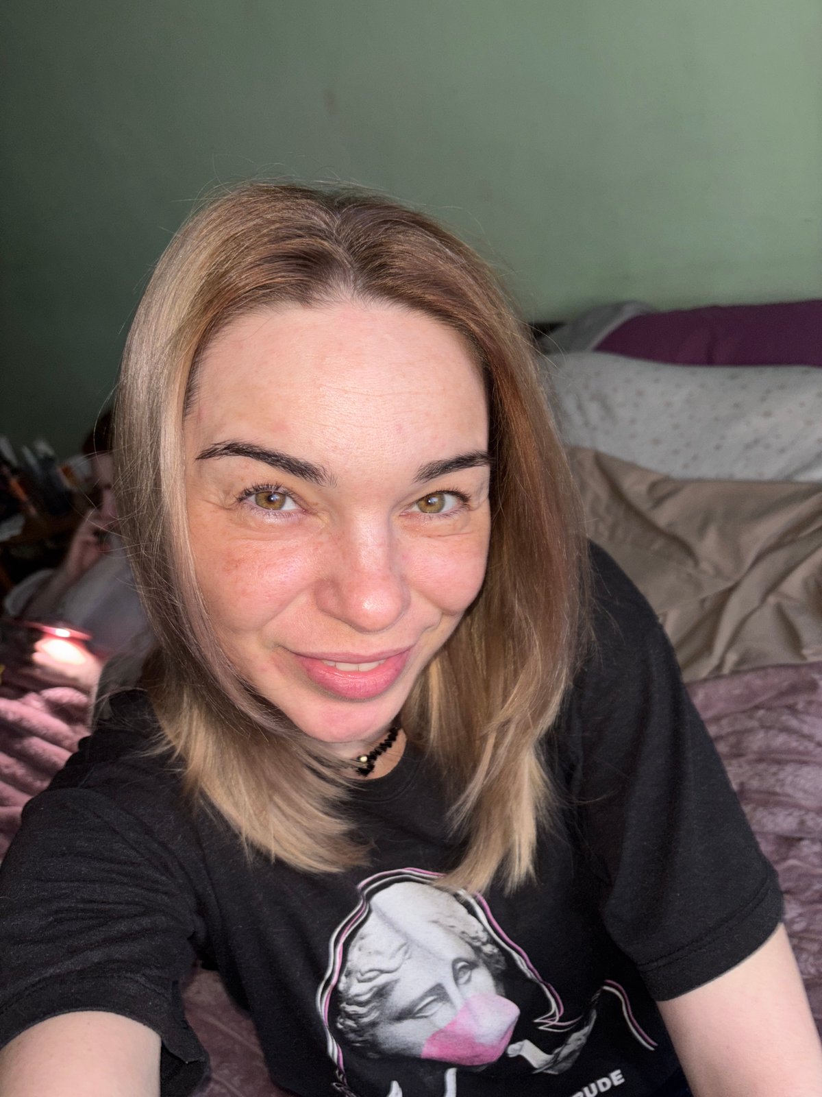 Woman takes indoor selfie in Lednevo, Russia