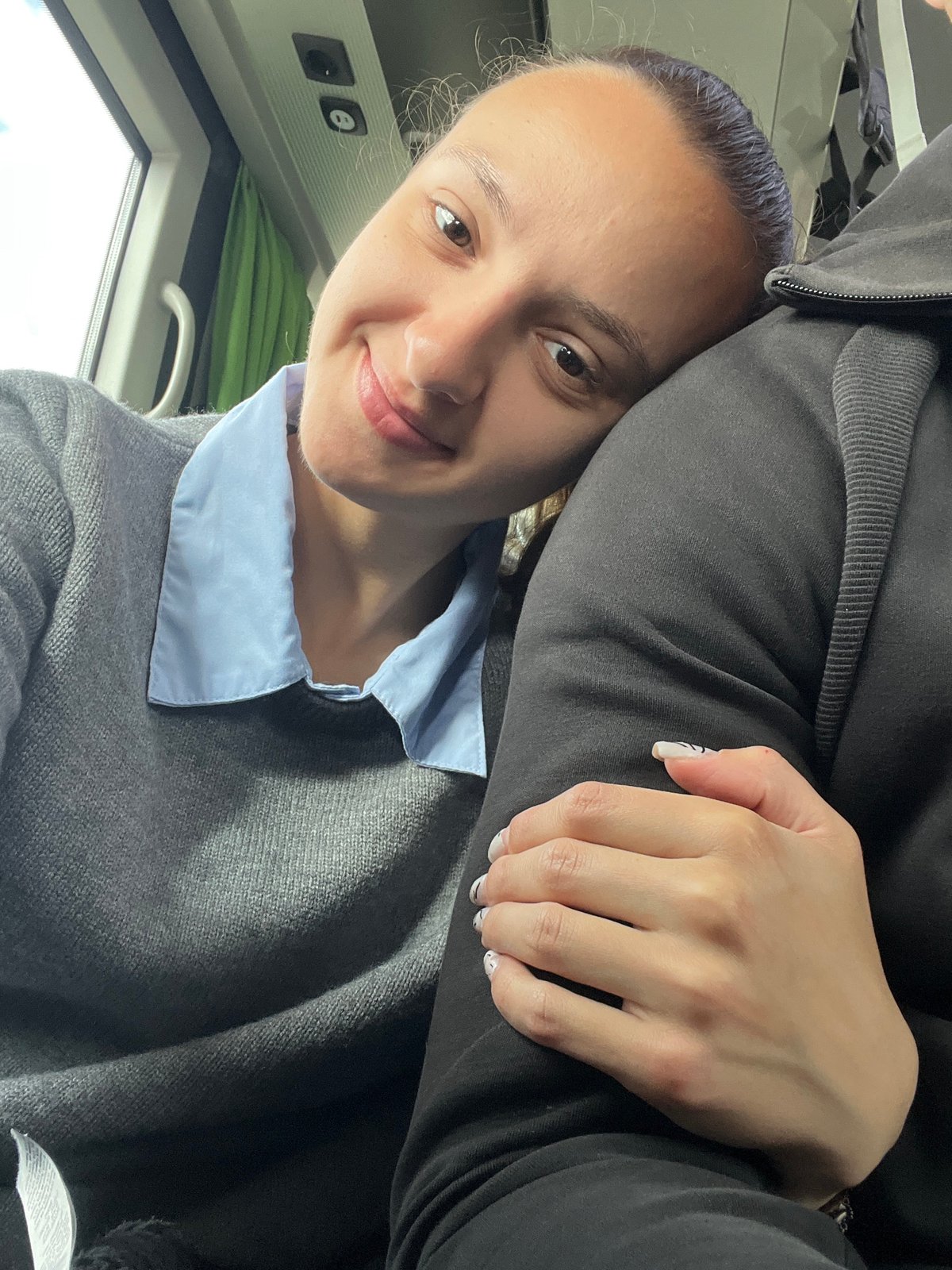 Woman takes selfie during train journey in Saarbrücken