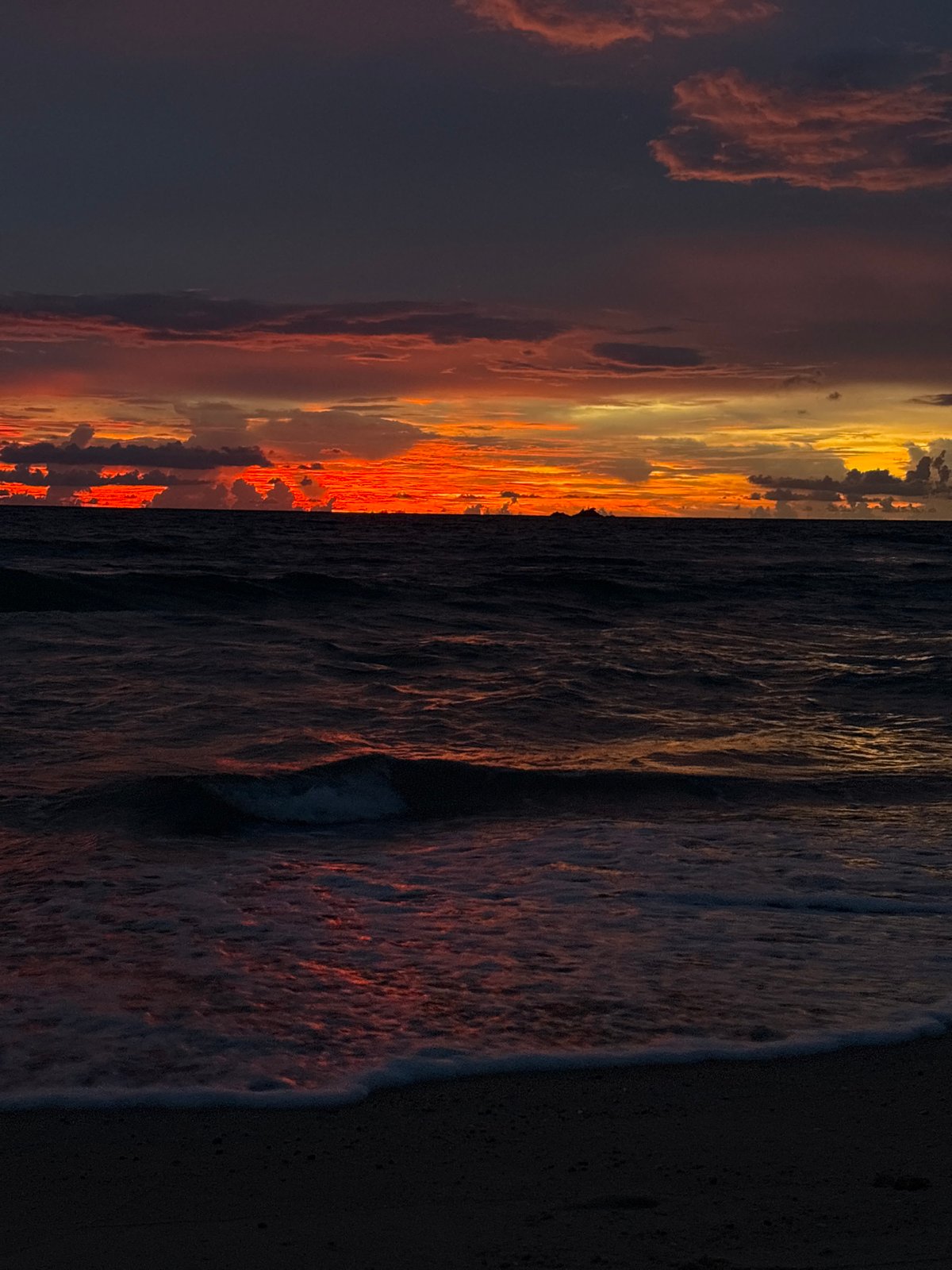 Sunset crowd gathers on Choeng Thale beach, Andaman Sea